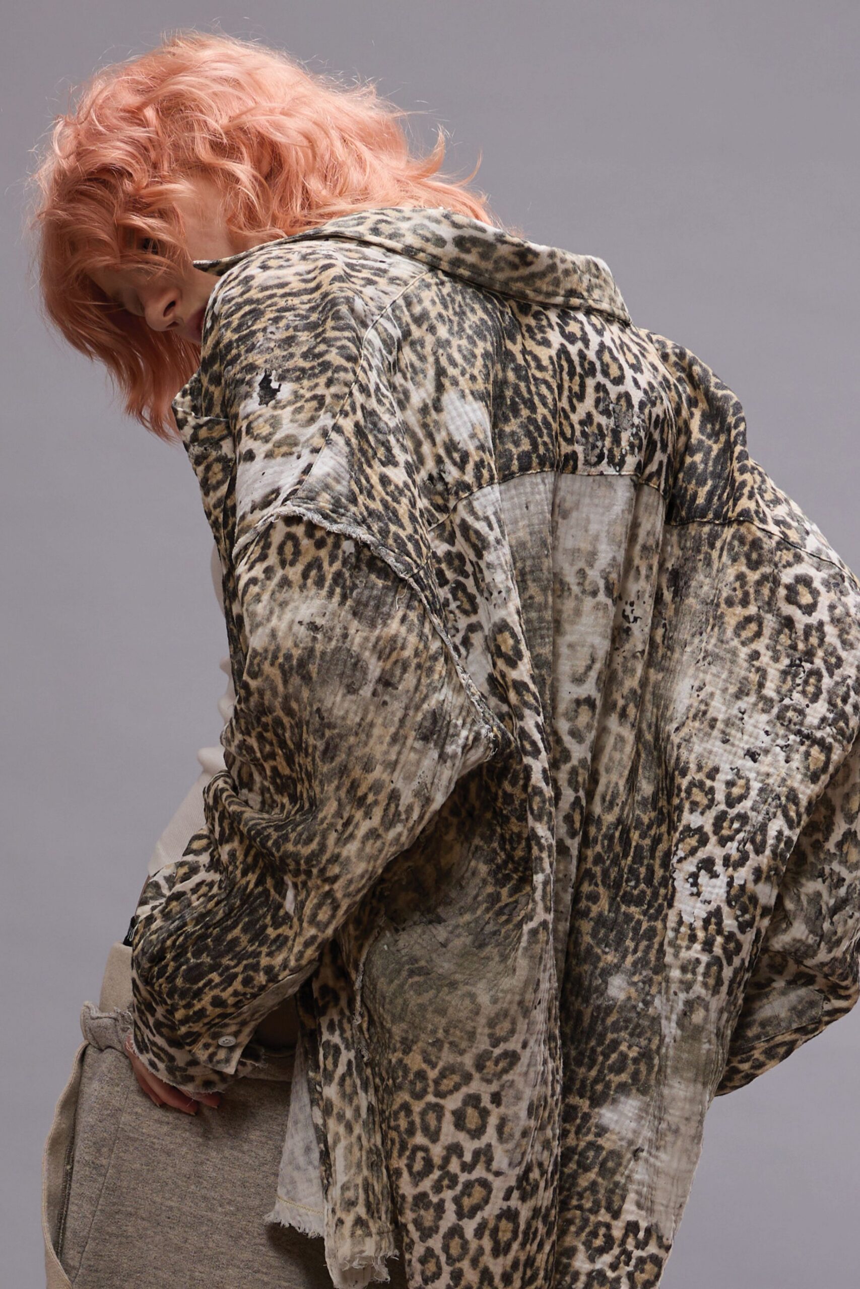 beige animal-print relaxed jacket and gray fitted top