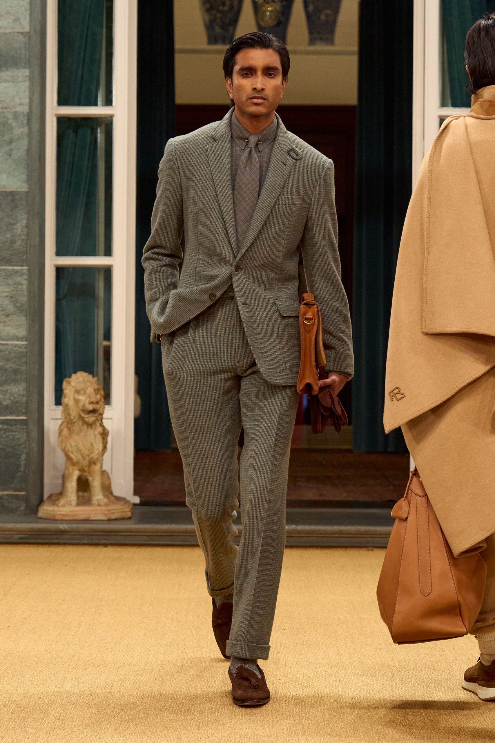 gray tailored suit with brown accessories