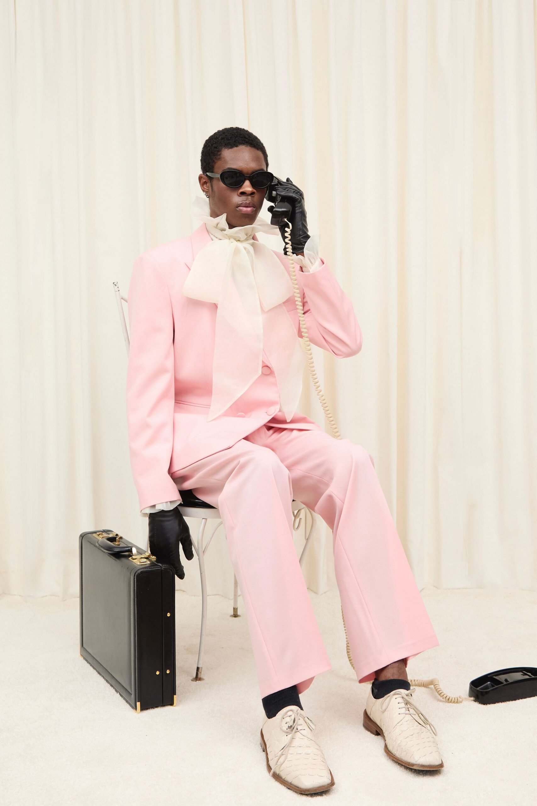 pink long-sleeve collared tailored suit