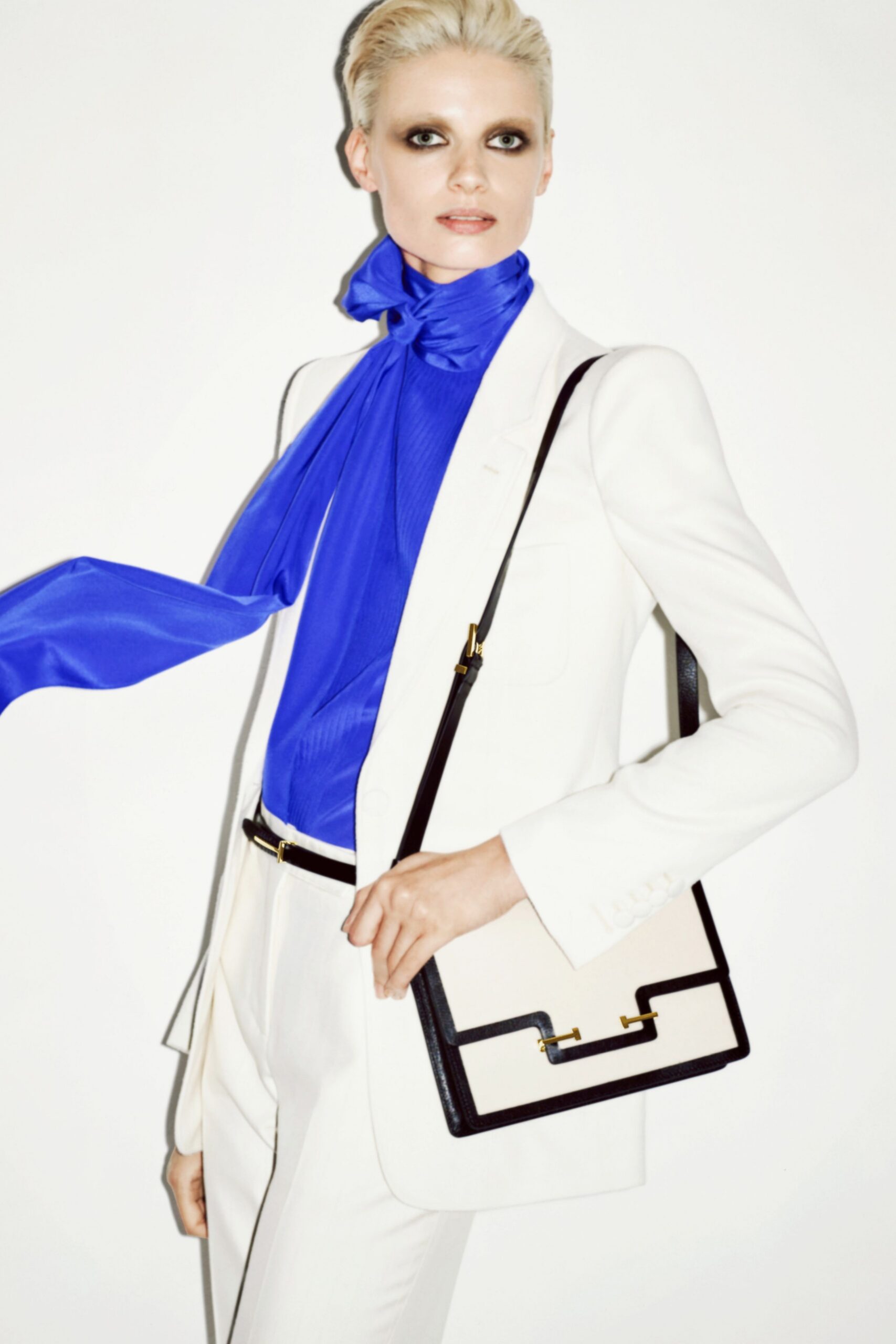 white tailored blazer with blue top