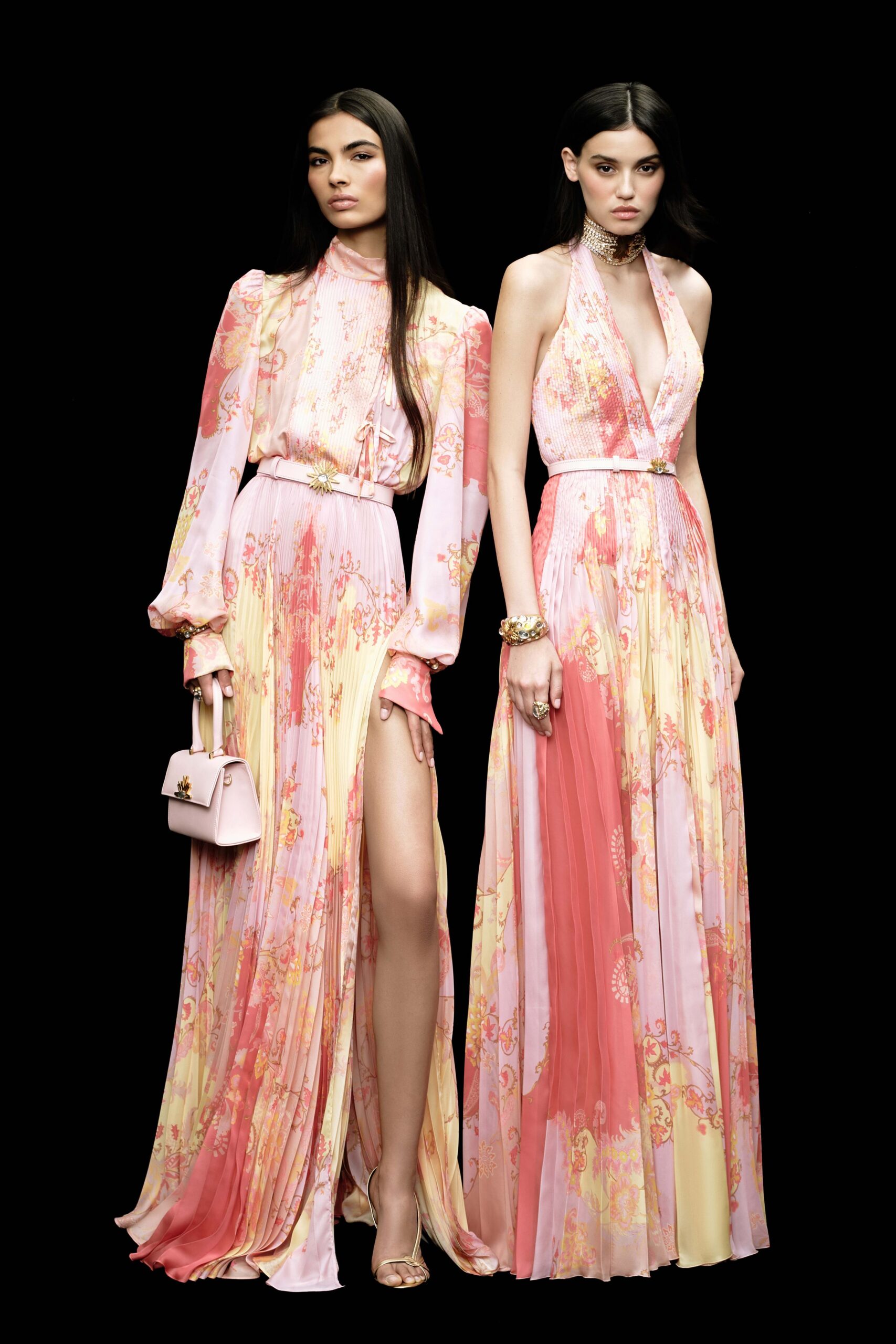 pink silk long-sleeve v-neck fitted pleated flared gown