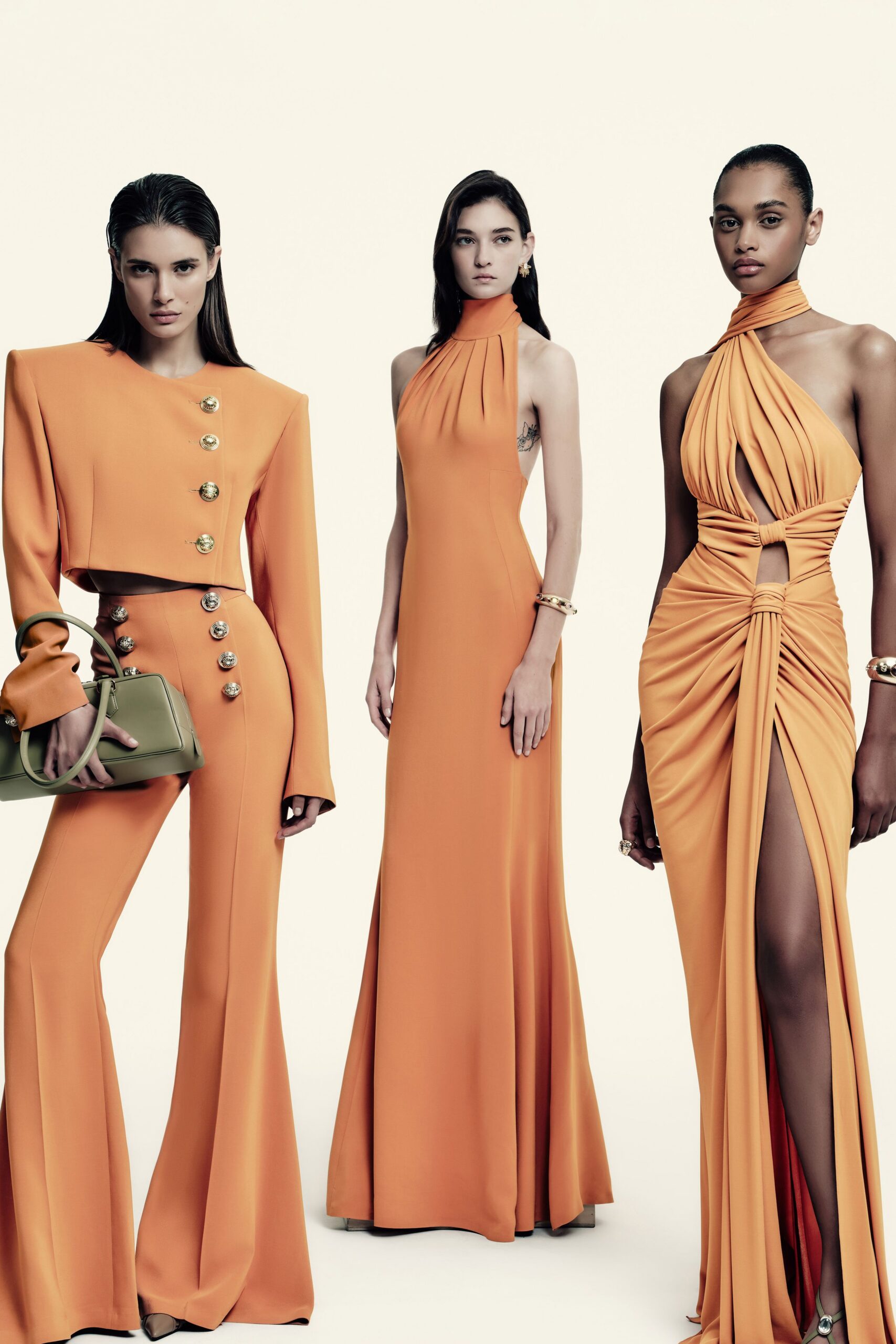 orange fitted suit and gowns