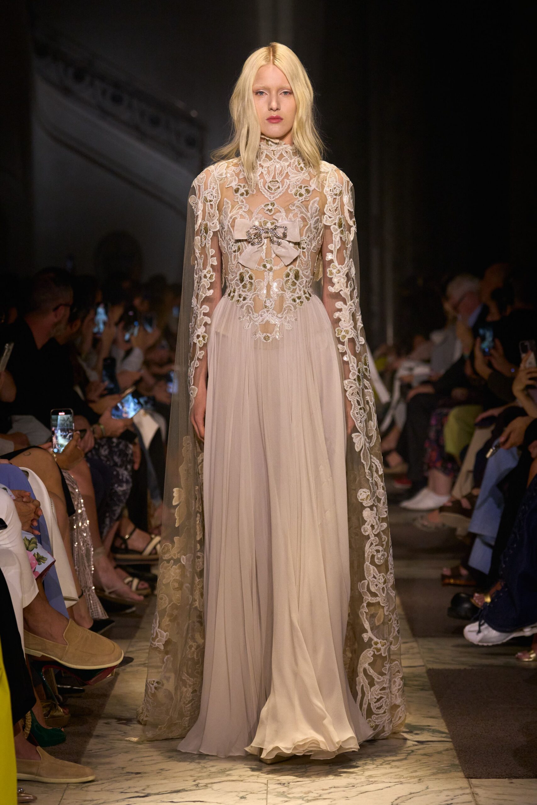 beige embroidered gown with cape