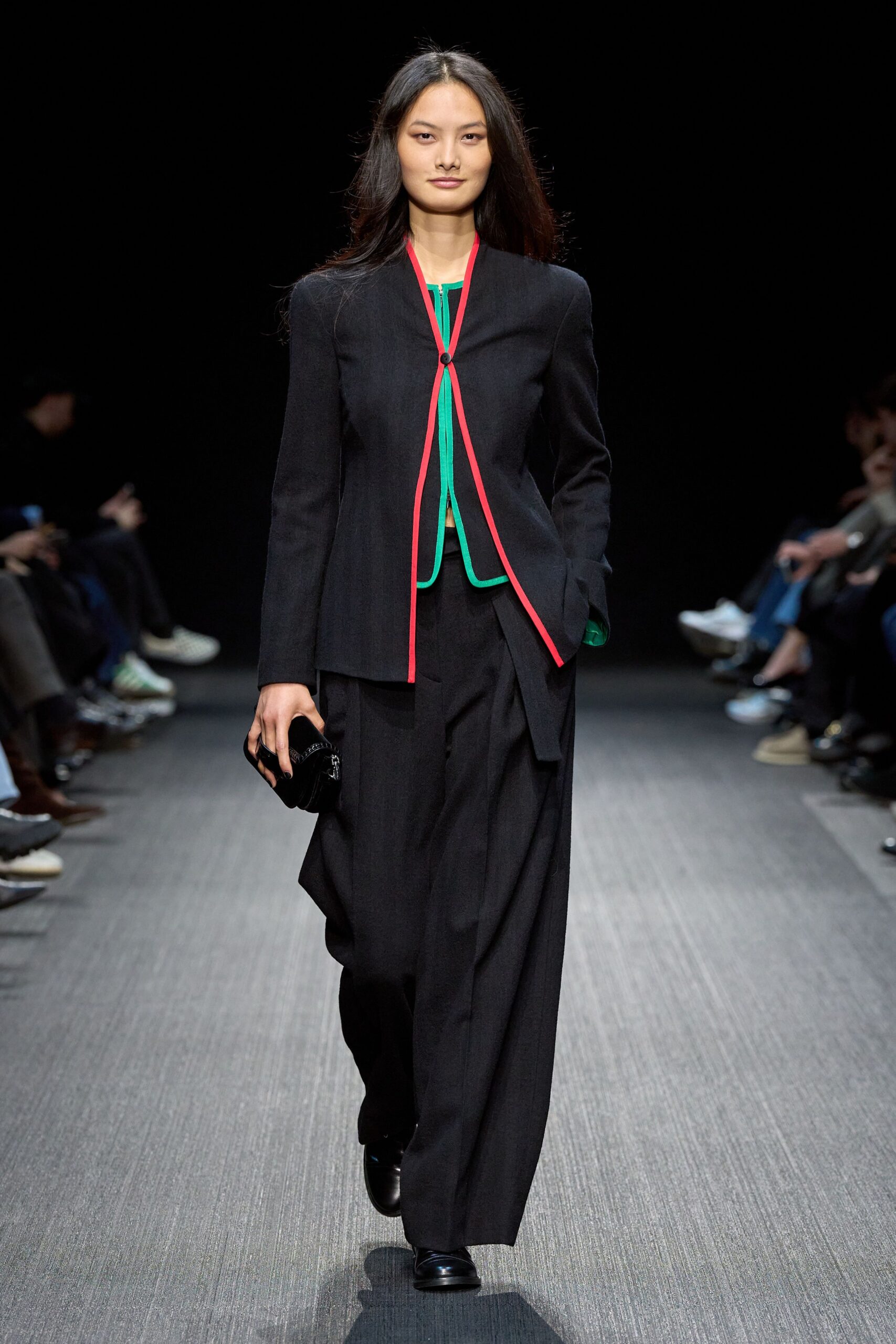 black tailored blazer with green top