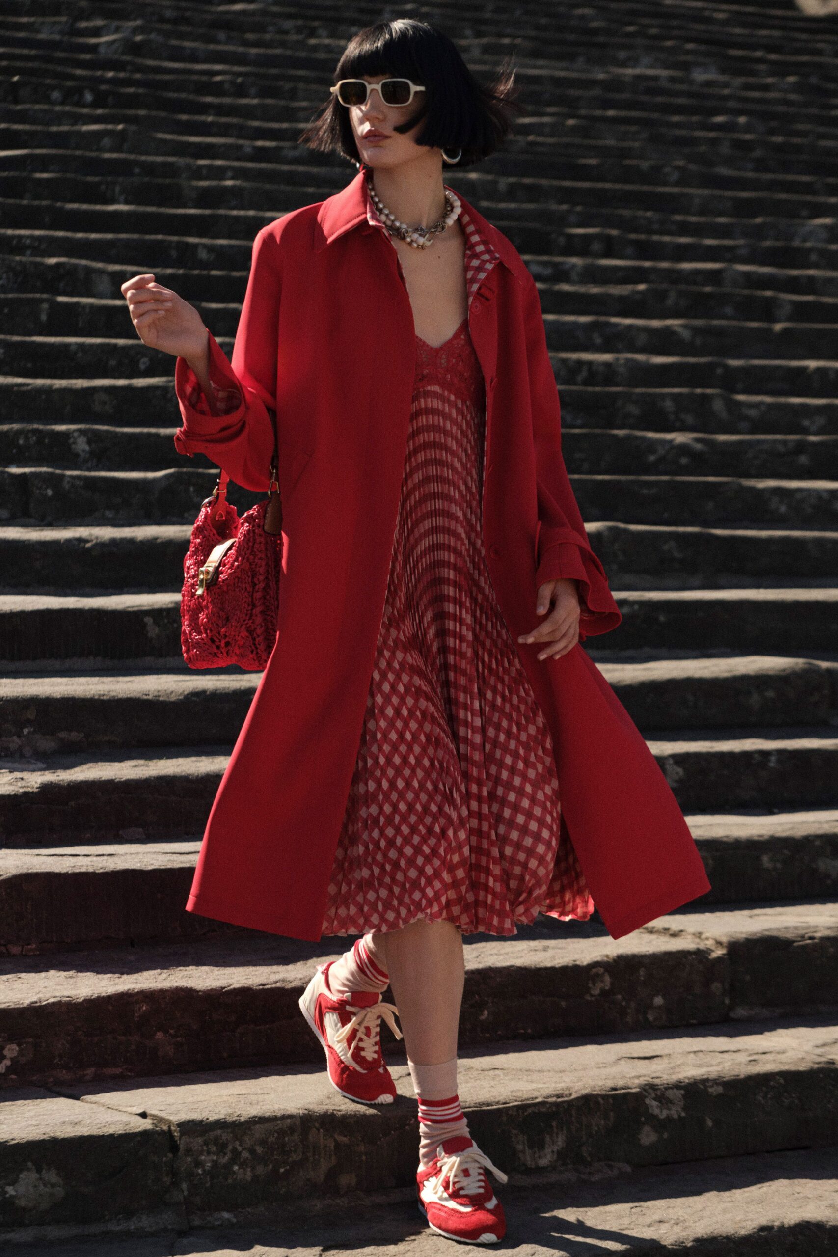 red coat and checked dress