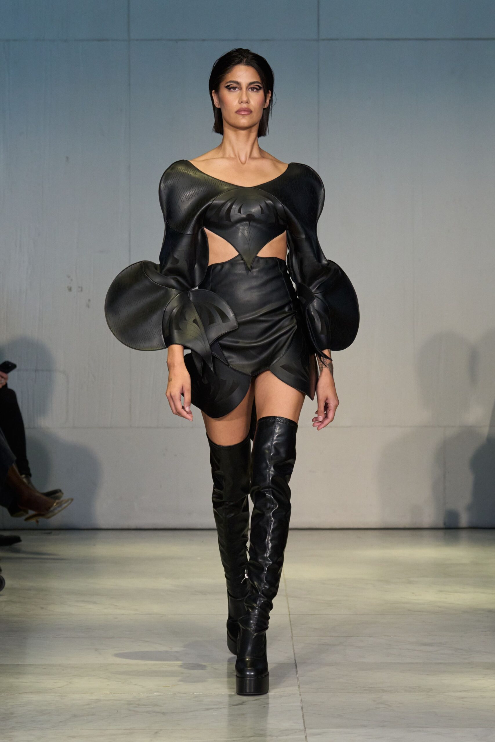 black leather sleeveless off-shoulder fitted draped mini dress
