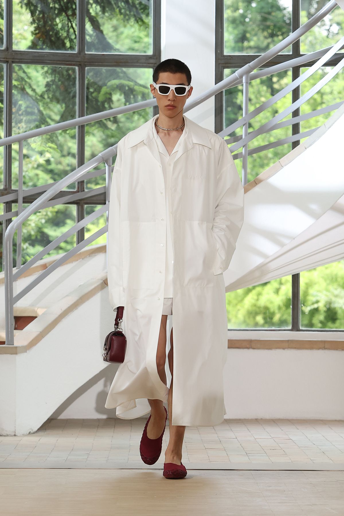 white coat over mini dress
