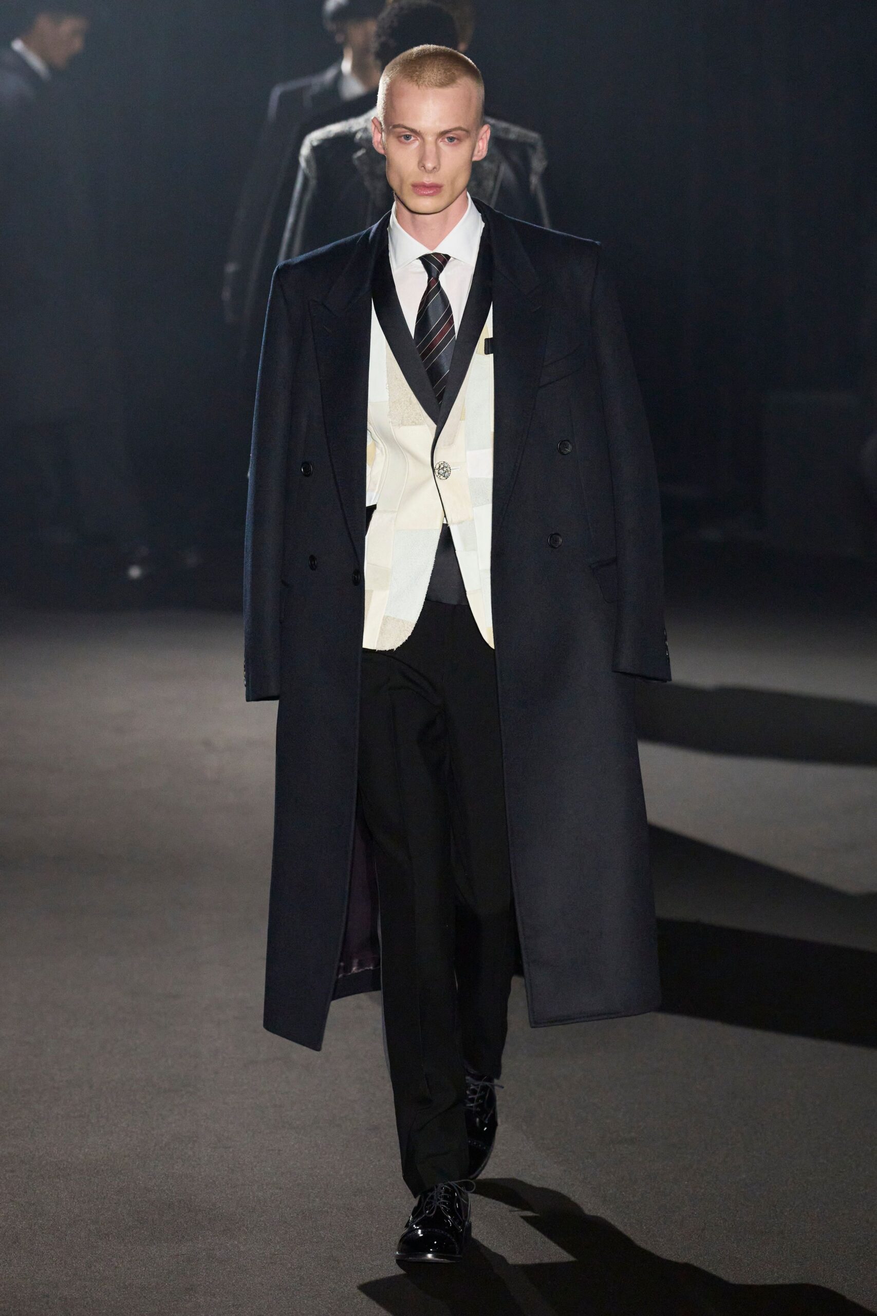 black wool coat and white blazer