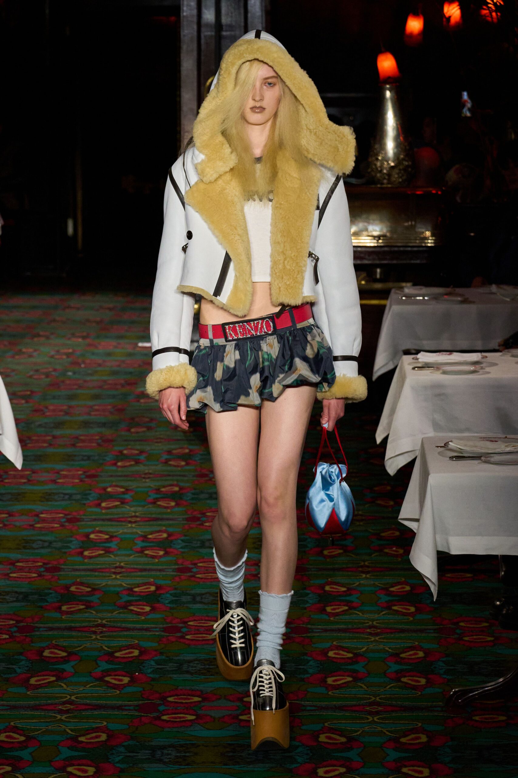 white jacket with camouflage shorts