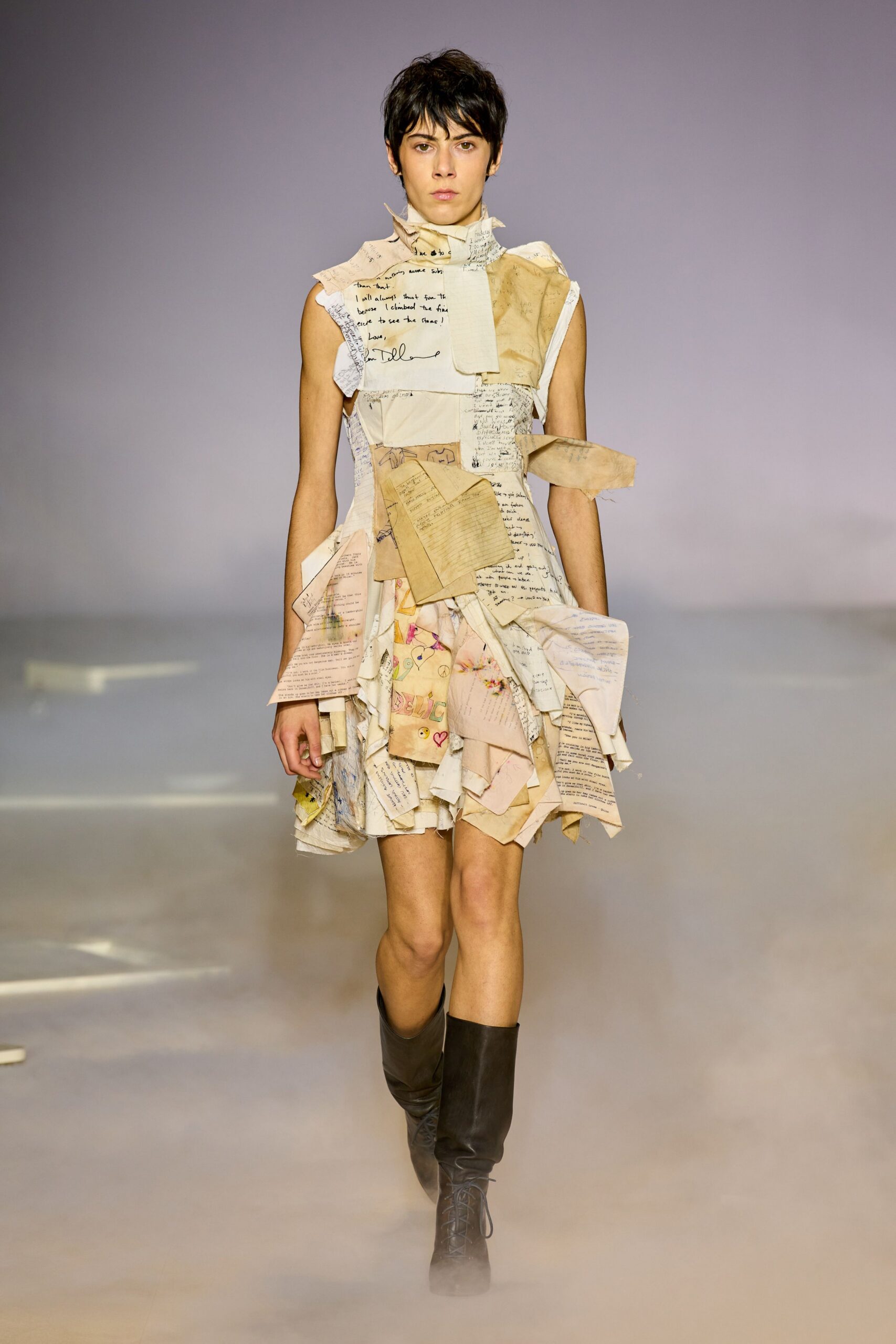 beige multi-layered mini dress with black boots