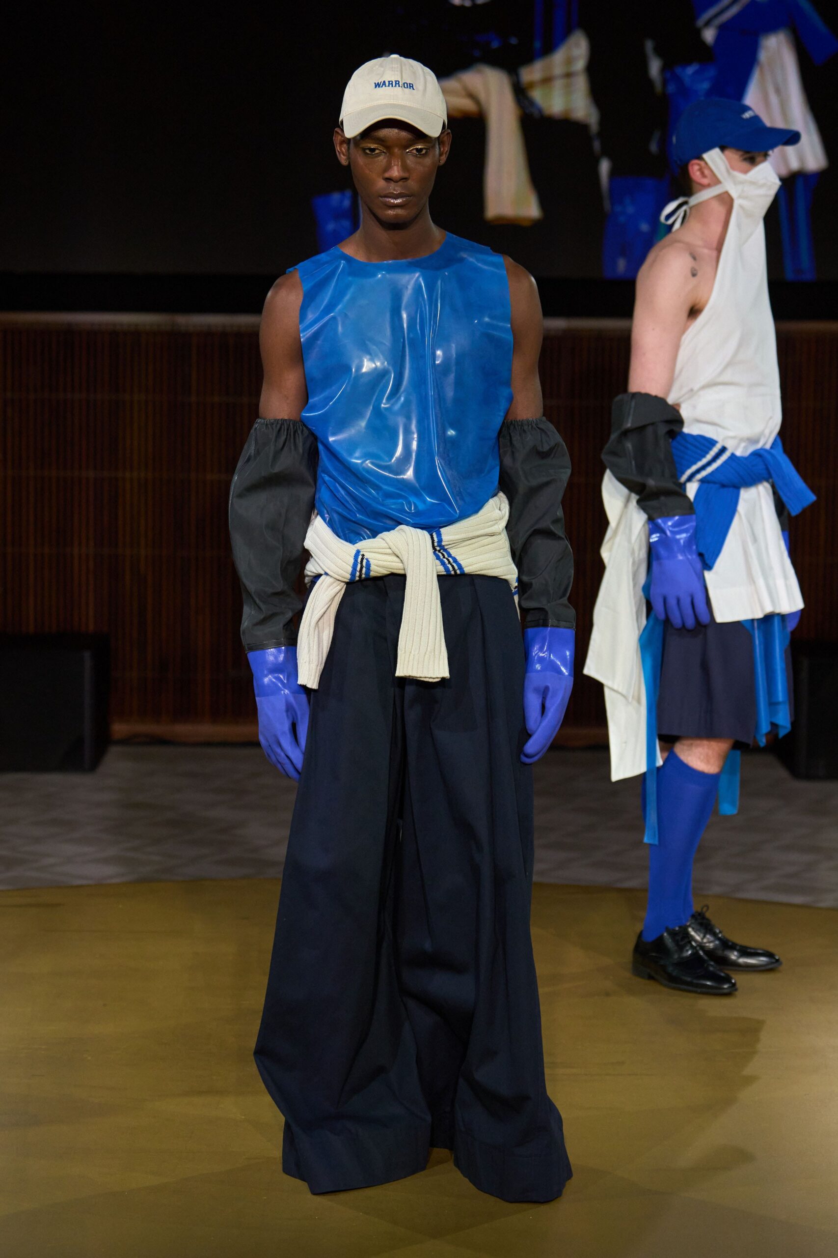 blue vinyl sleeveless high-neck fitted shiny top
