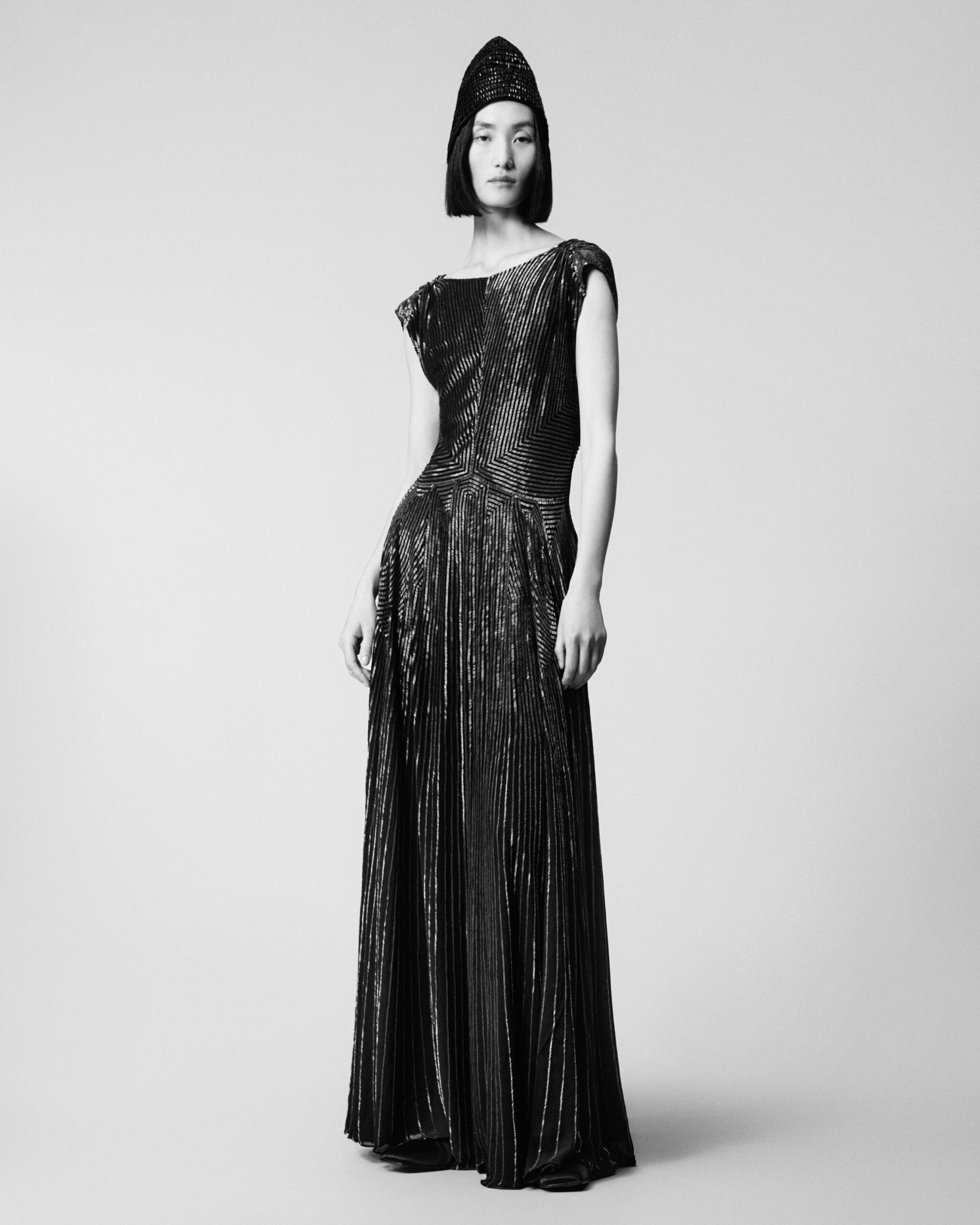 black silk short-sleeve v-neck fitted pleated shiny gown