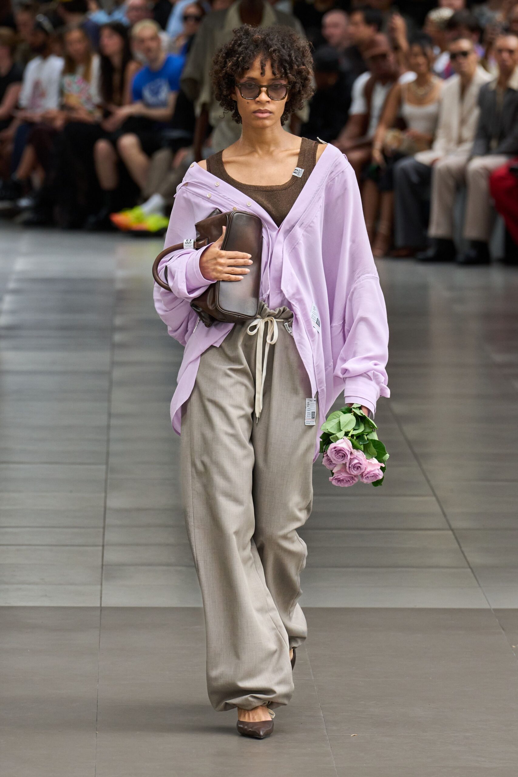 purple relaxed shirt with beige pants