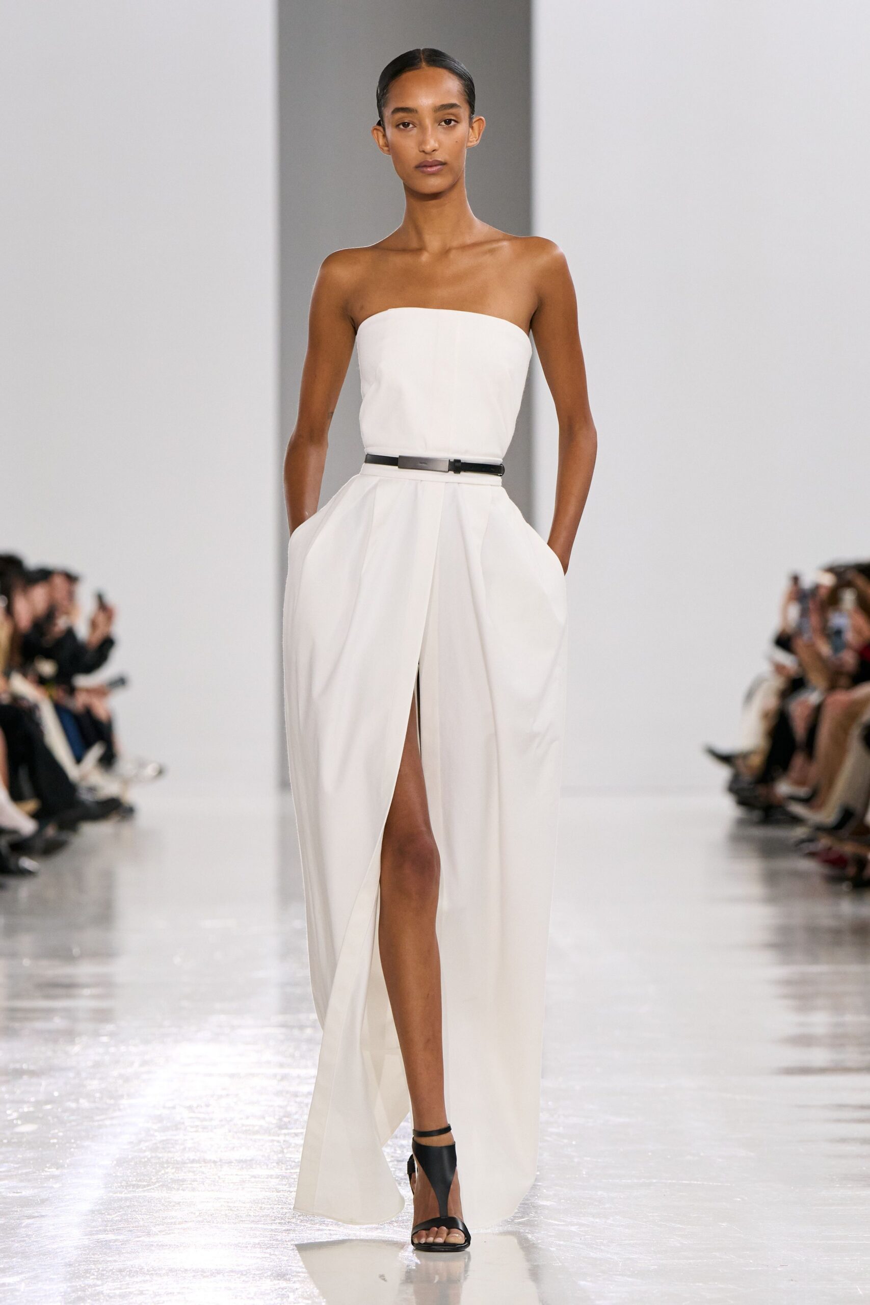 white silk strapless slit fitted pleated maxi gown
