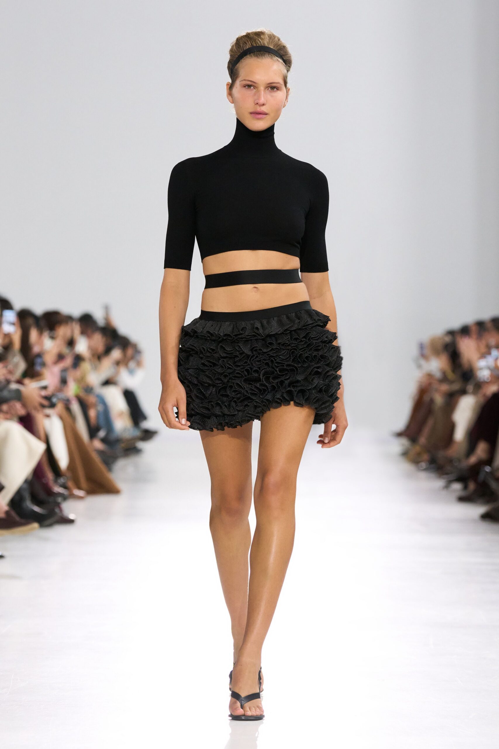 black cropped top with ruffled skirt