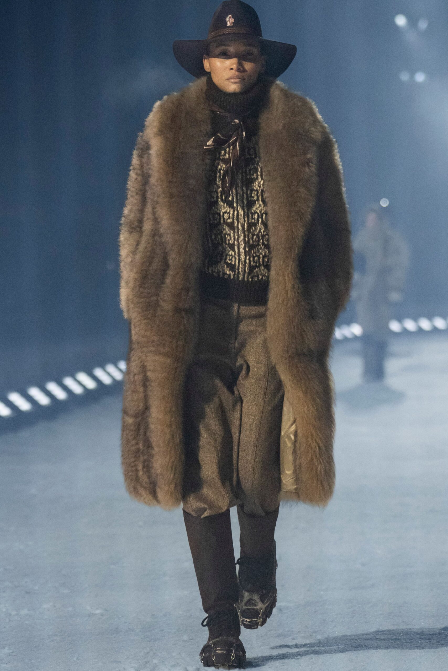 brown fur coat with black sweater