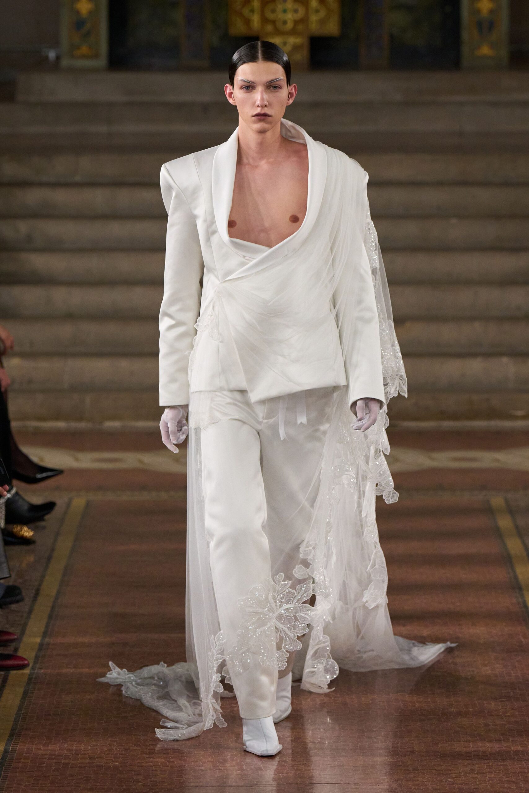 white fitted suit with gloves