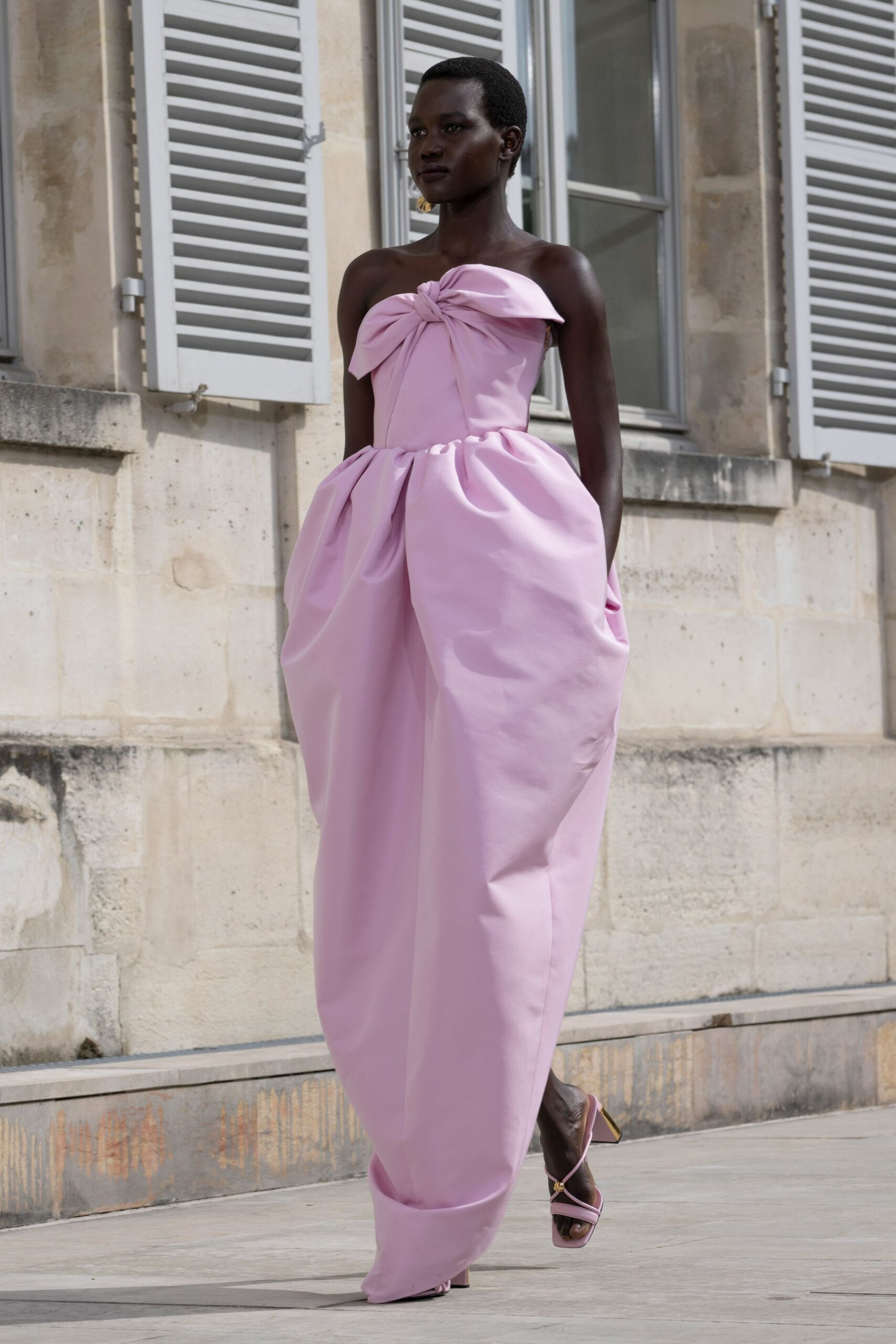 pink silk strapless fitted pleated maxi gown