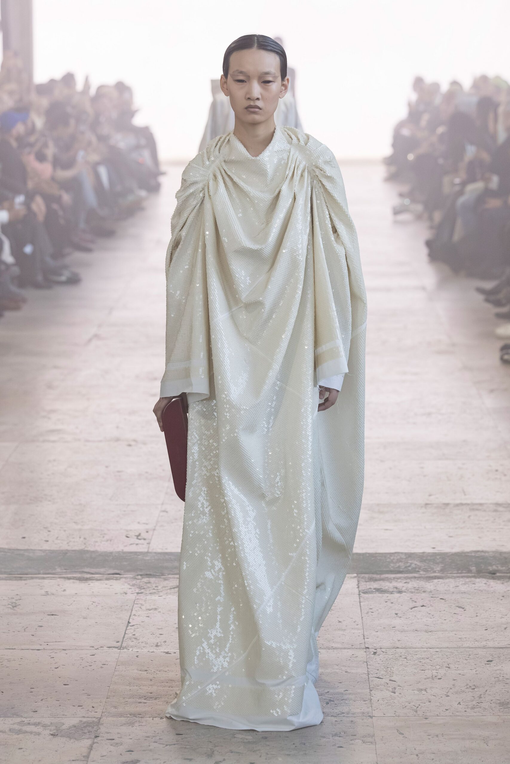 white silk long-sleeve high-neck relaxed draped gown
