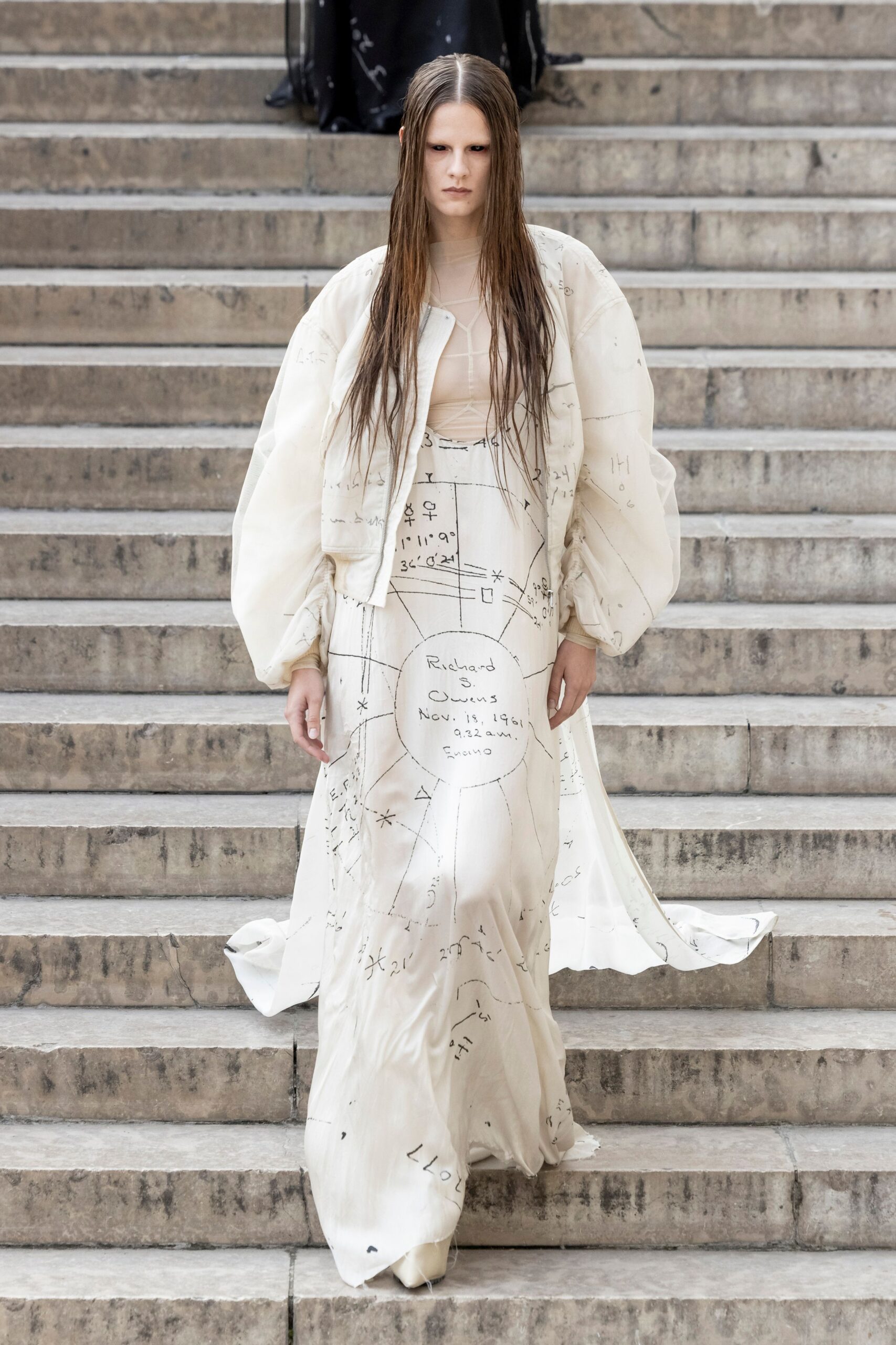 white silk sleeveless v-neck fitted printed flowing gown
