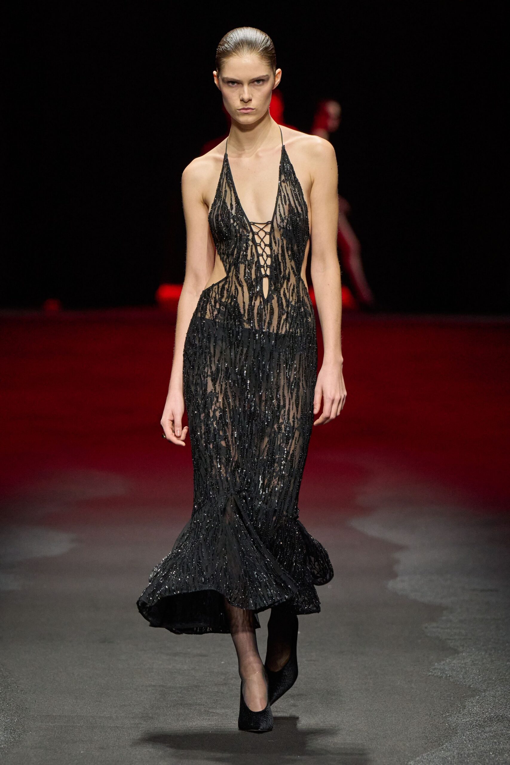 black sequined sleeveless gown