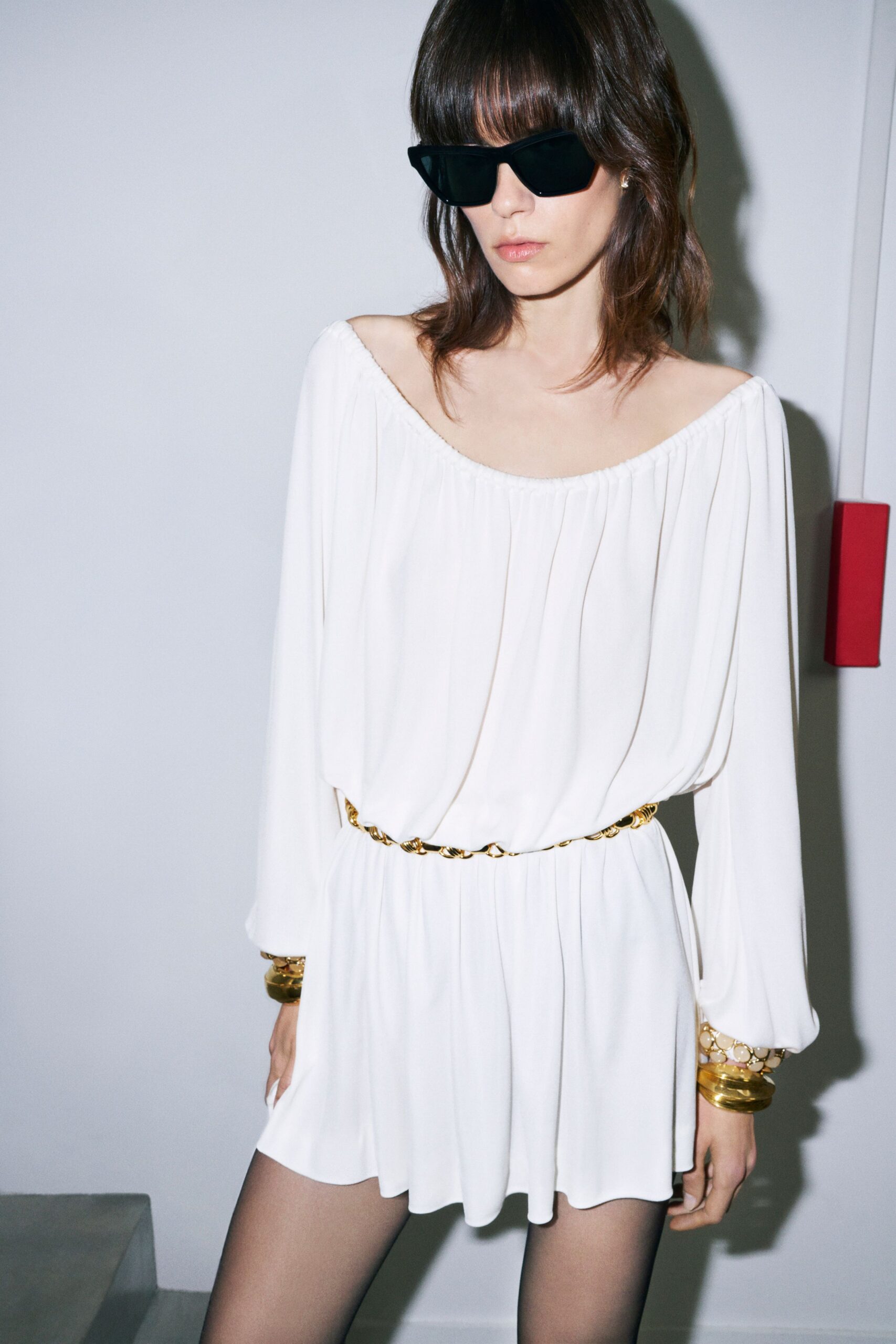 white silk long-sleeve off-shoulder relaxed belted short dress