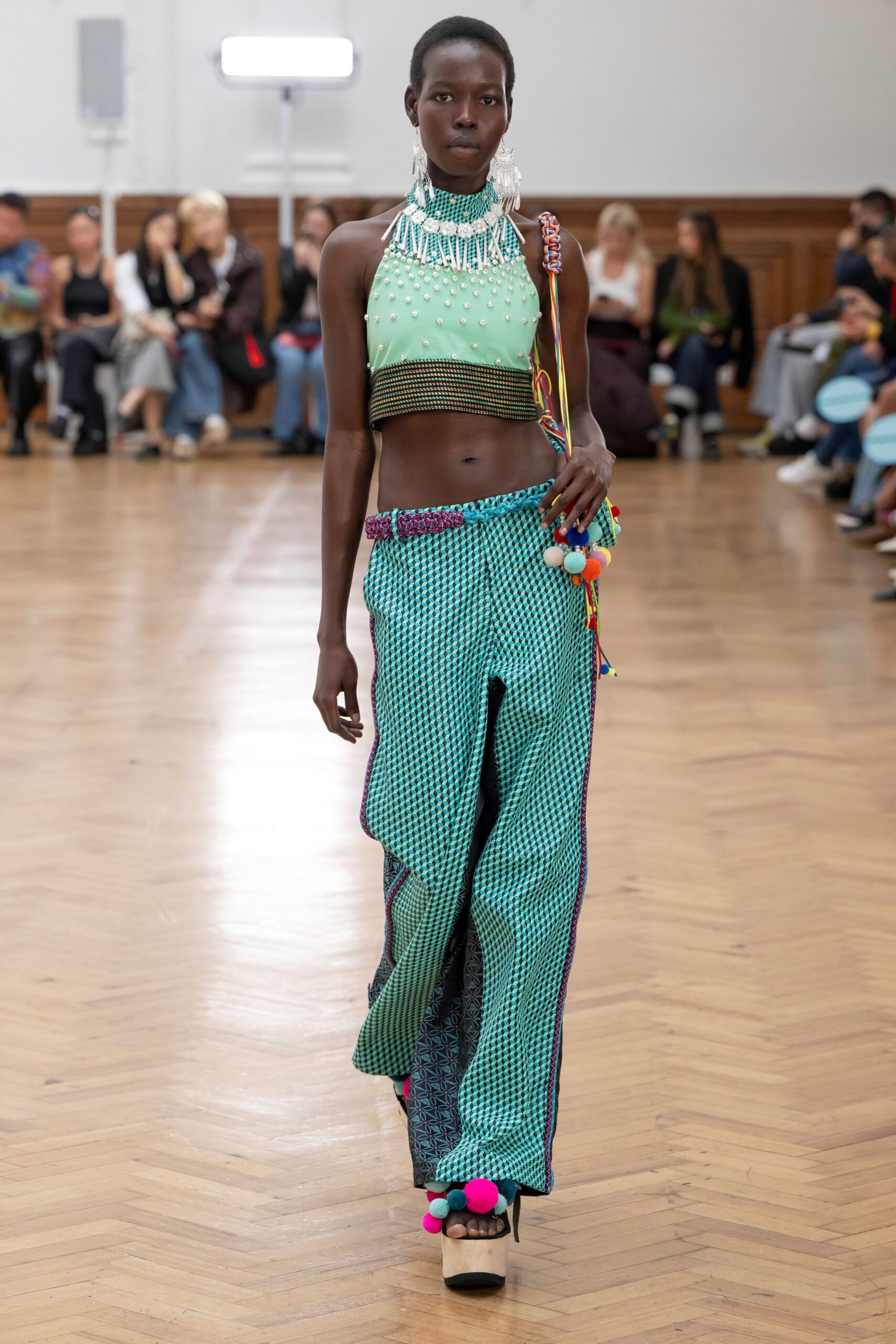 green cotton sleeveless high-neck fitted embroidered cropped top