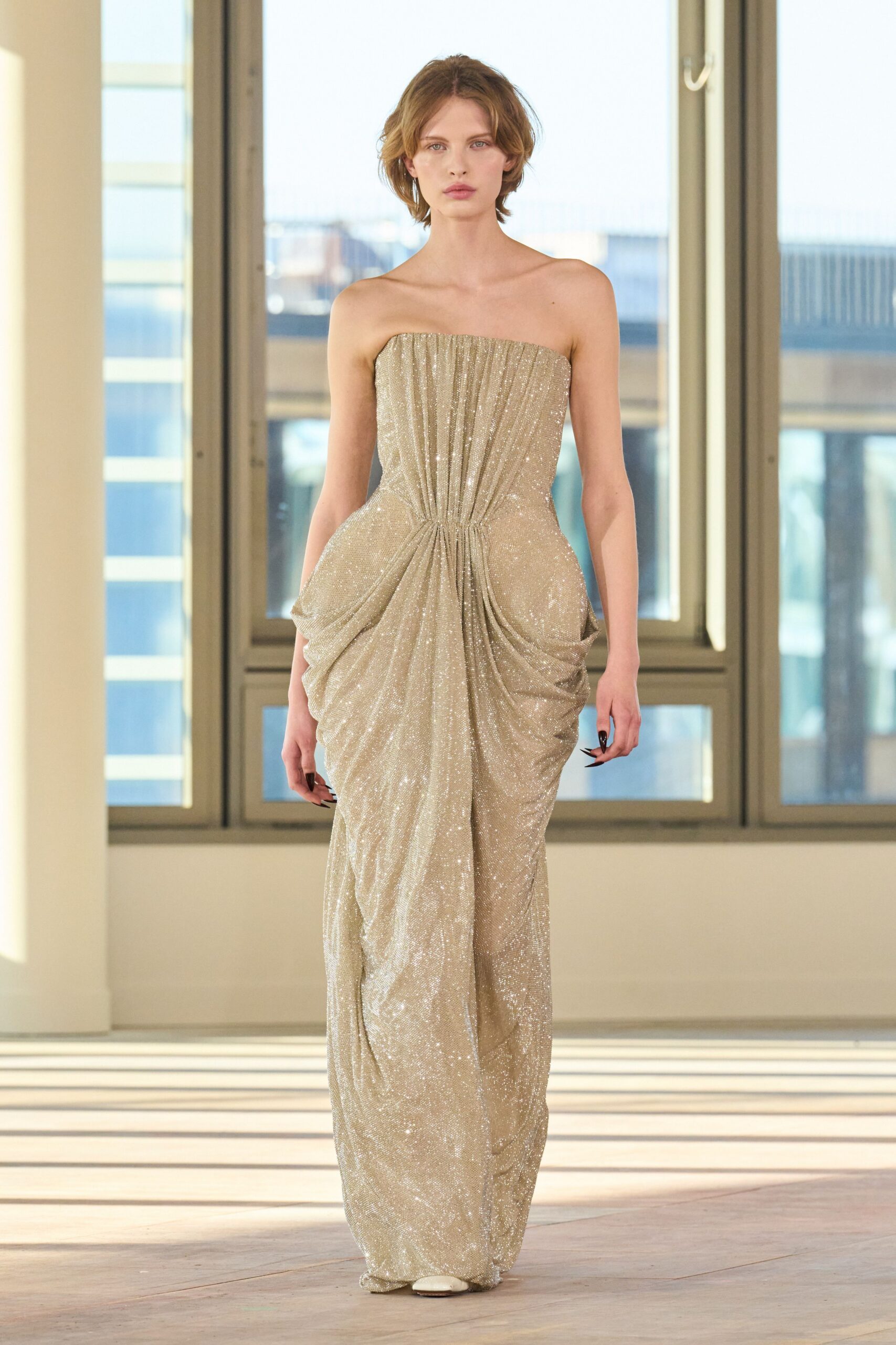 gold strapless pleated gown