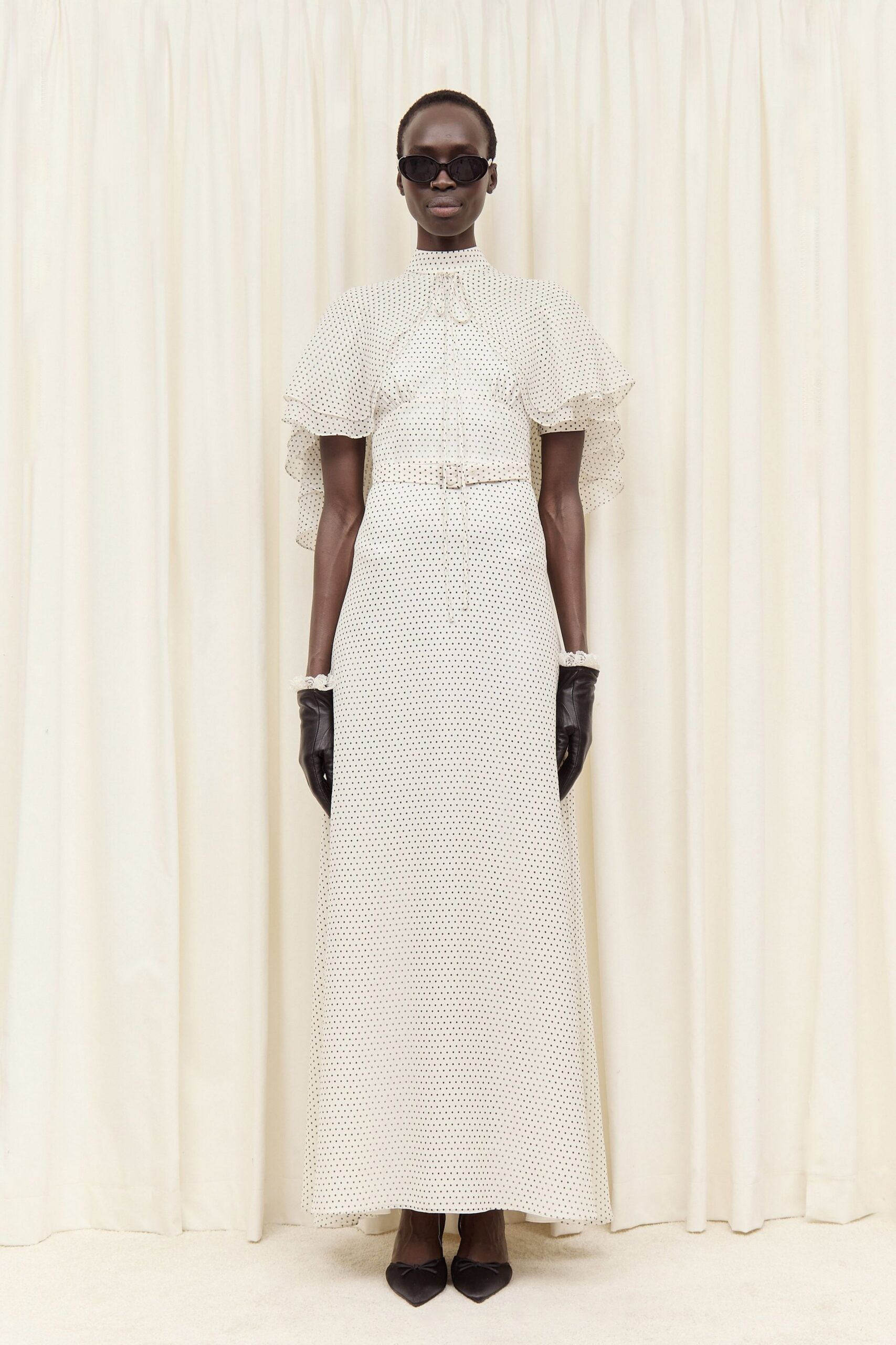 white silk long-sleeve high-neck fitted polka-dot belted gown