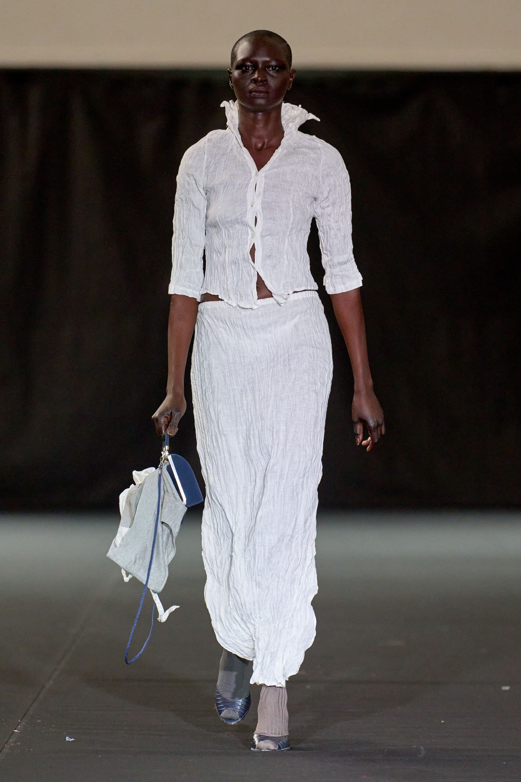 white cotton long-sleeve collared fitted pleated top