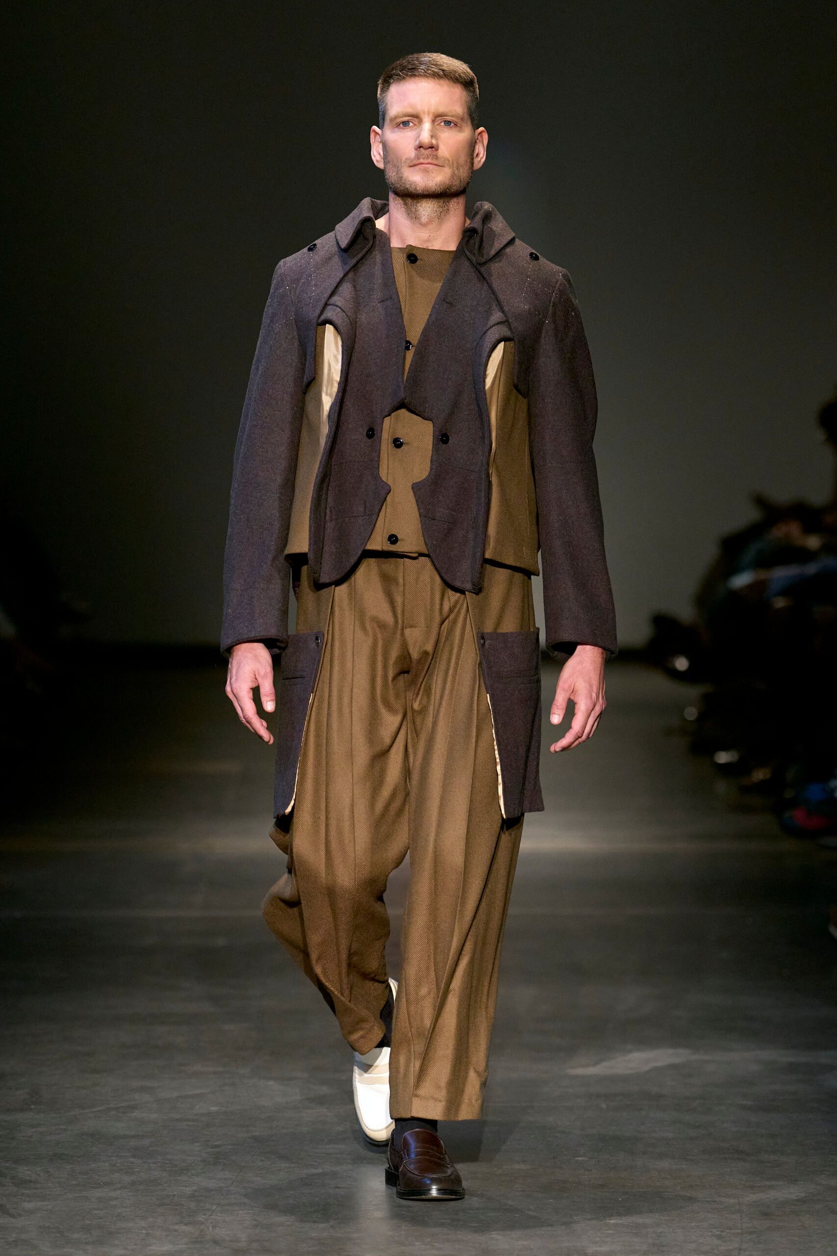 brown relaxed jacket with black blazer