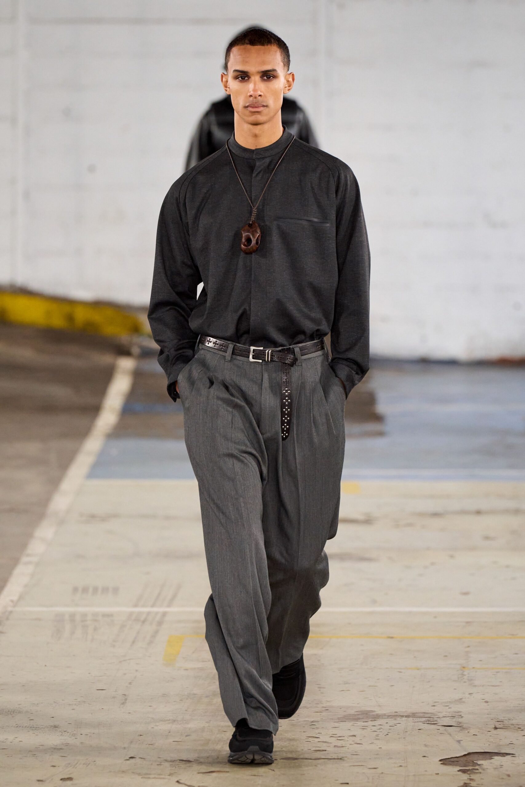 black shirt gray pants outfit