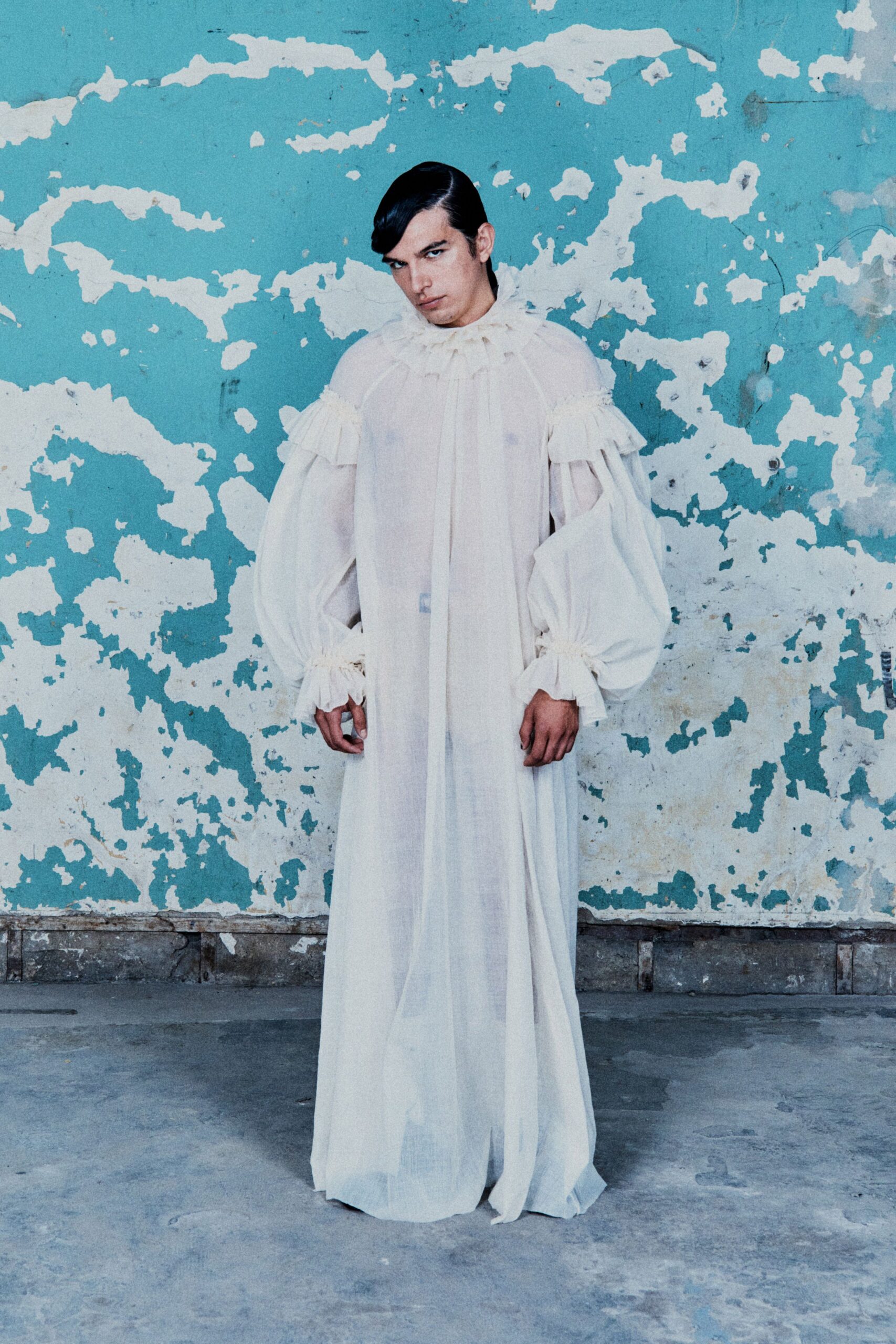 white relaxed ruffled gown