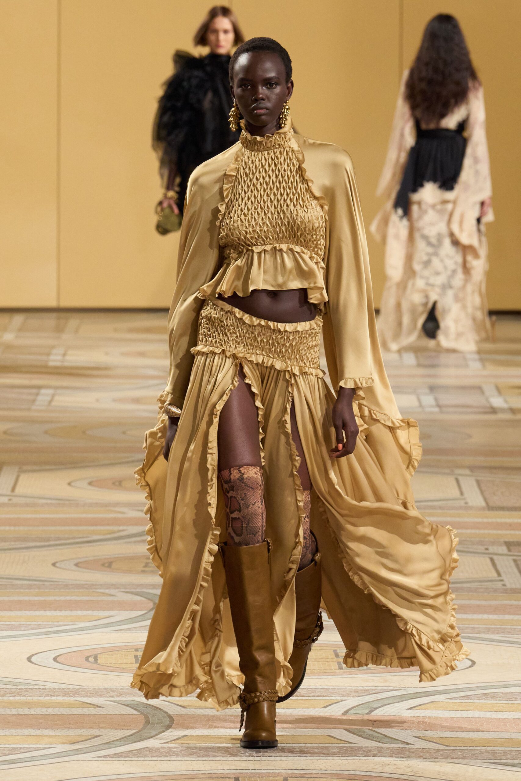 gold silk sleeveless v-neck fitted ruffled layered gown
