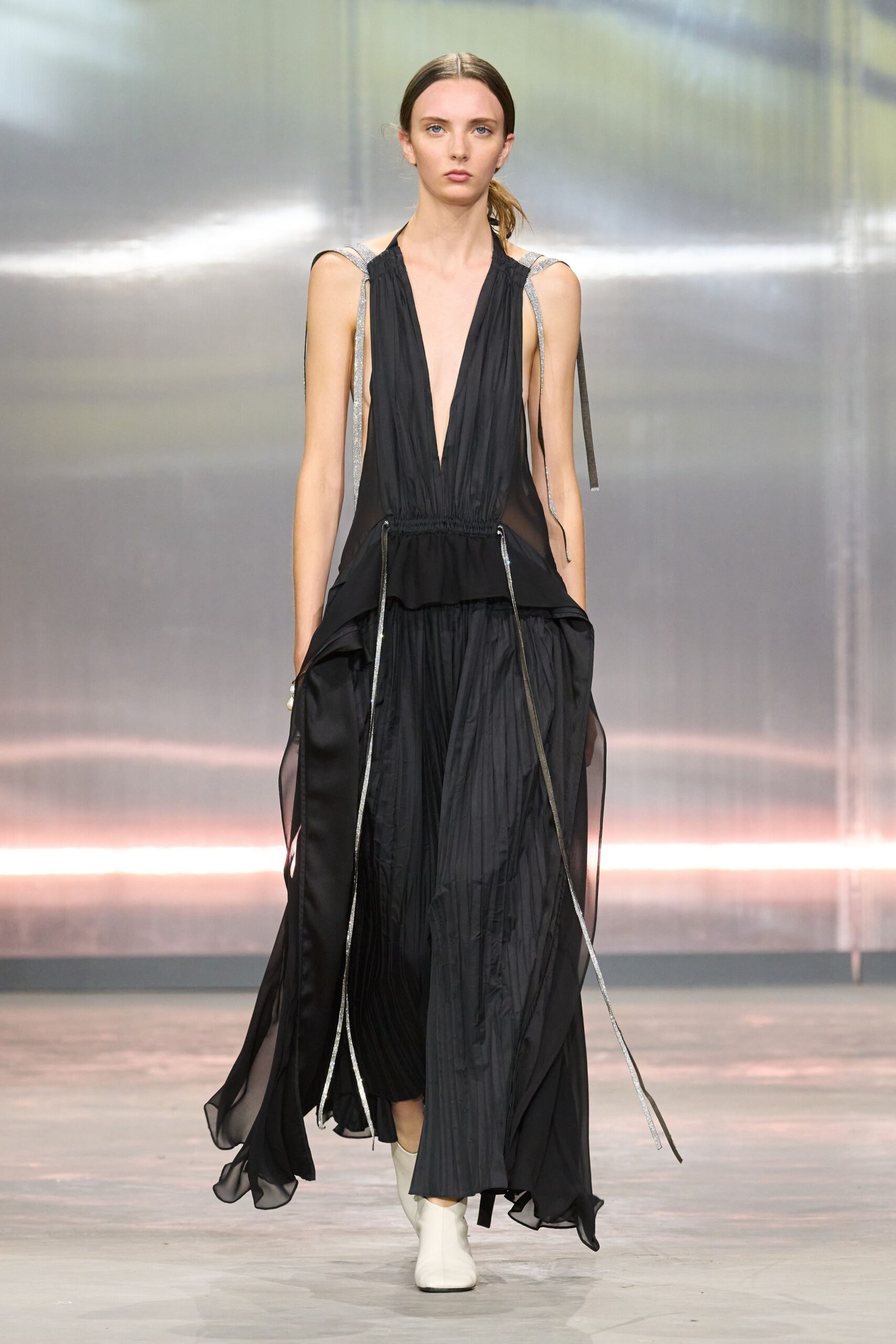 black pleated maxi dress with white shoes