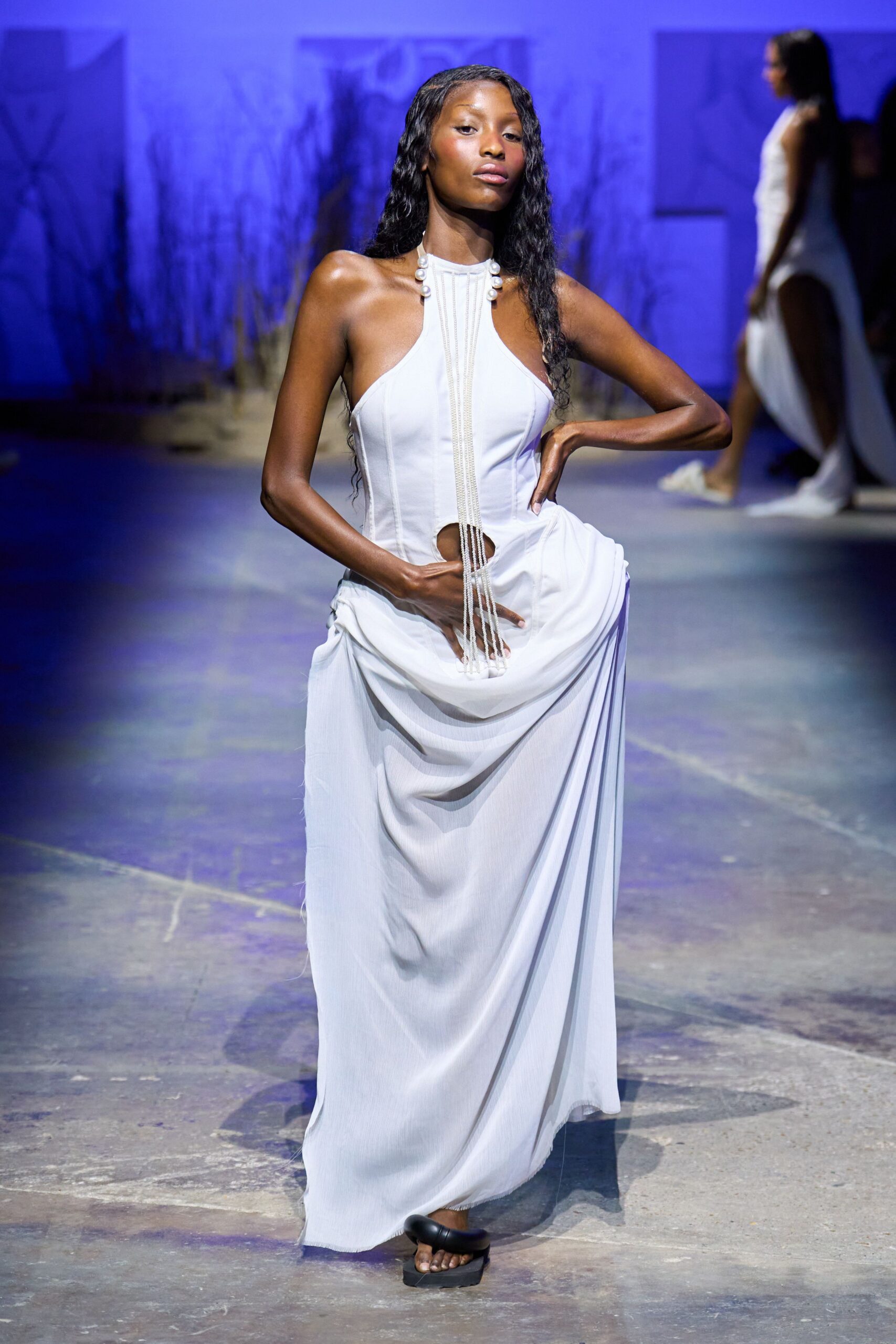 white chiffon sleeveless halter fitted draped flowing gown