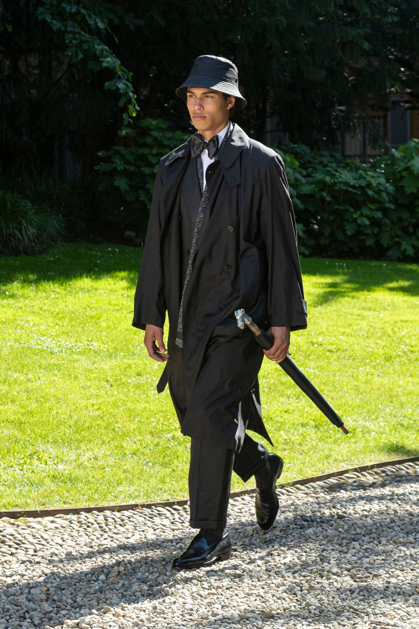 black trench coat and suit