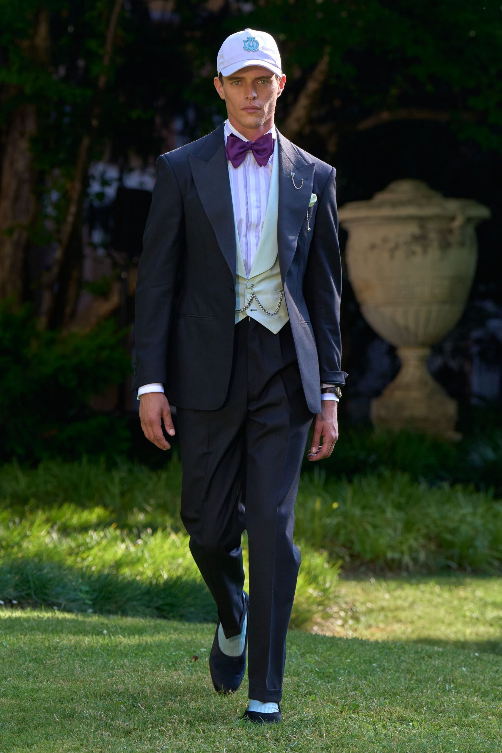 black tailored suit with beige vest