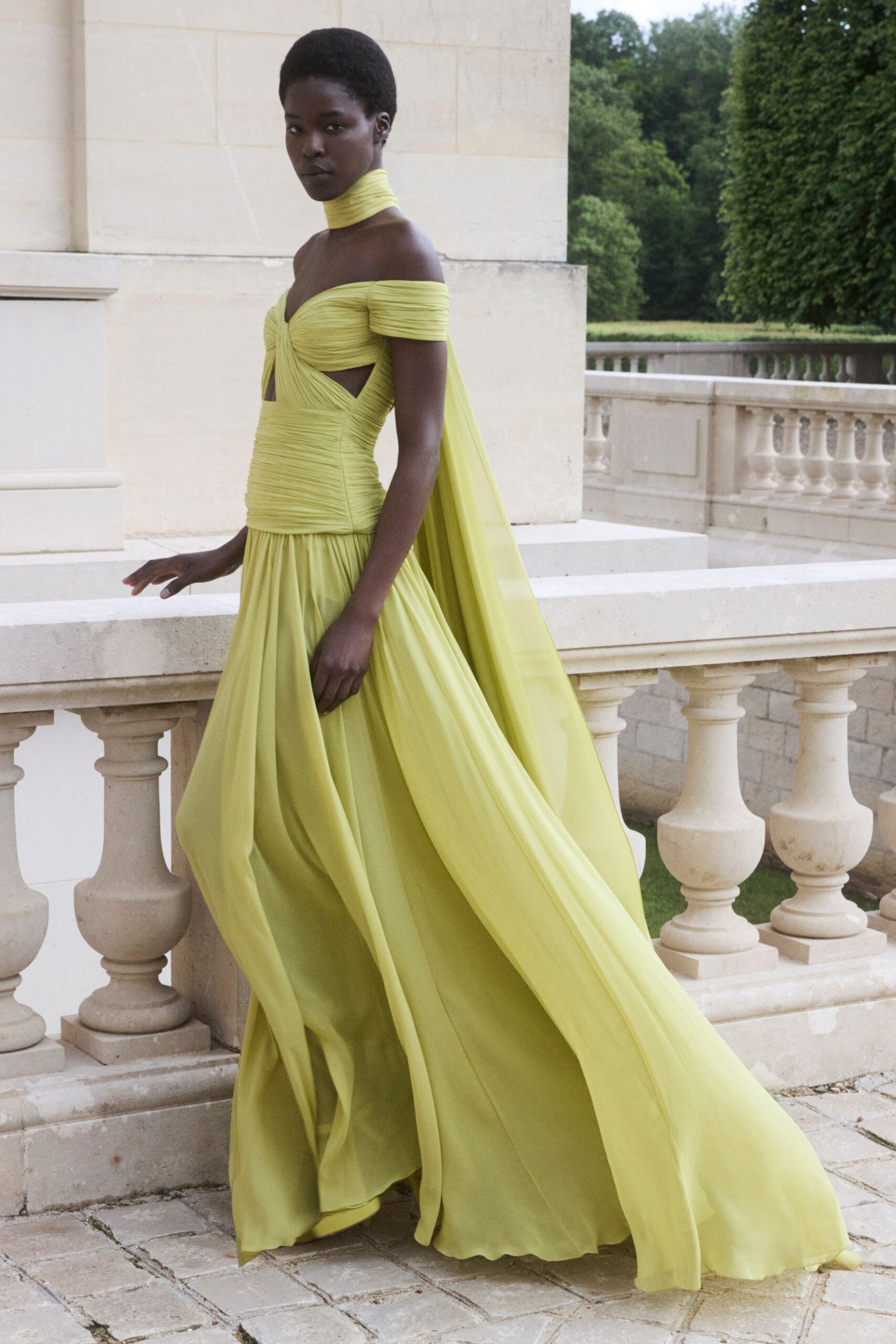 yellow off-shoulder flowing gown