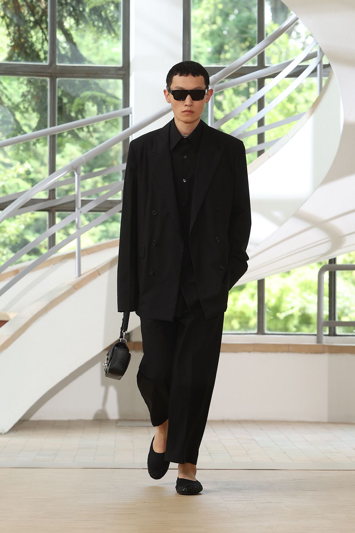 black relaxed suit with accessories