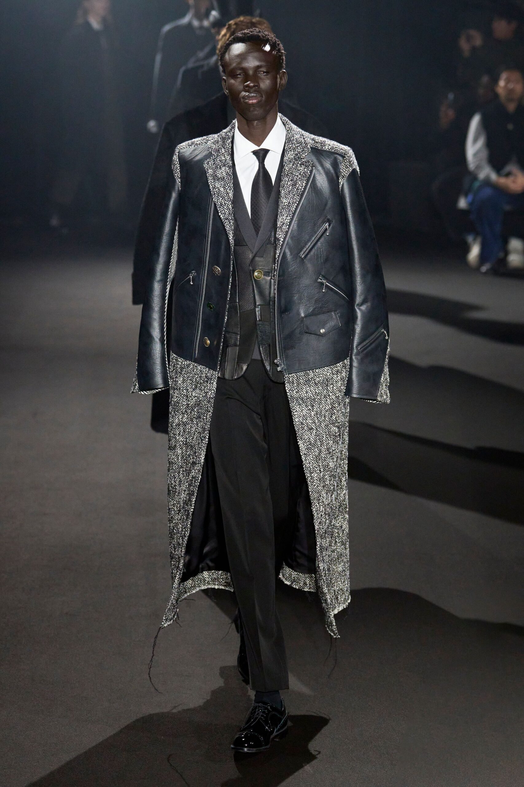 black leather long-sleeve collared relaxed buttoned layered coat
