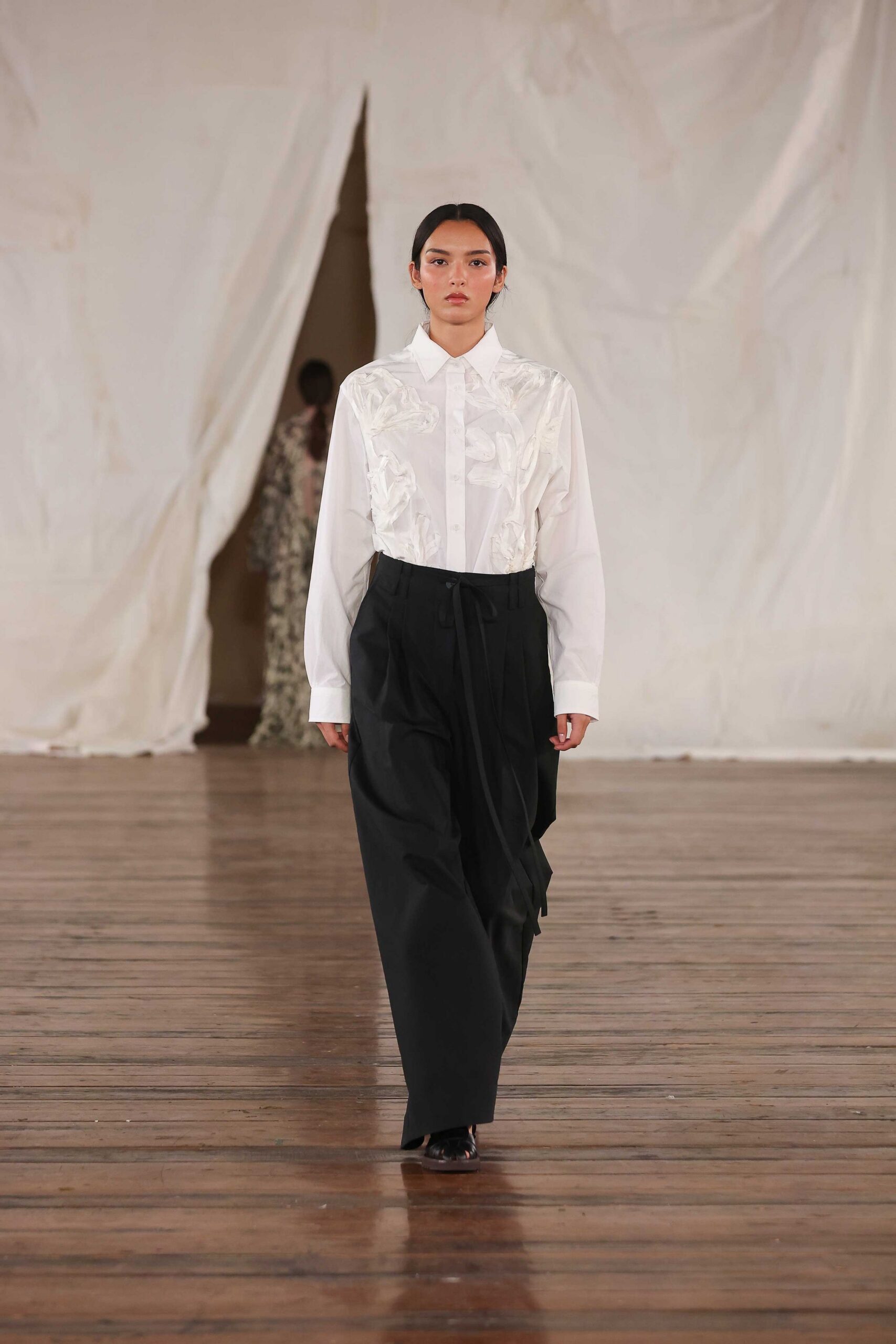white collared shirt black pants