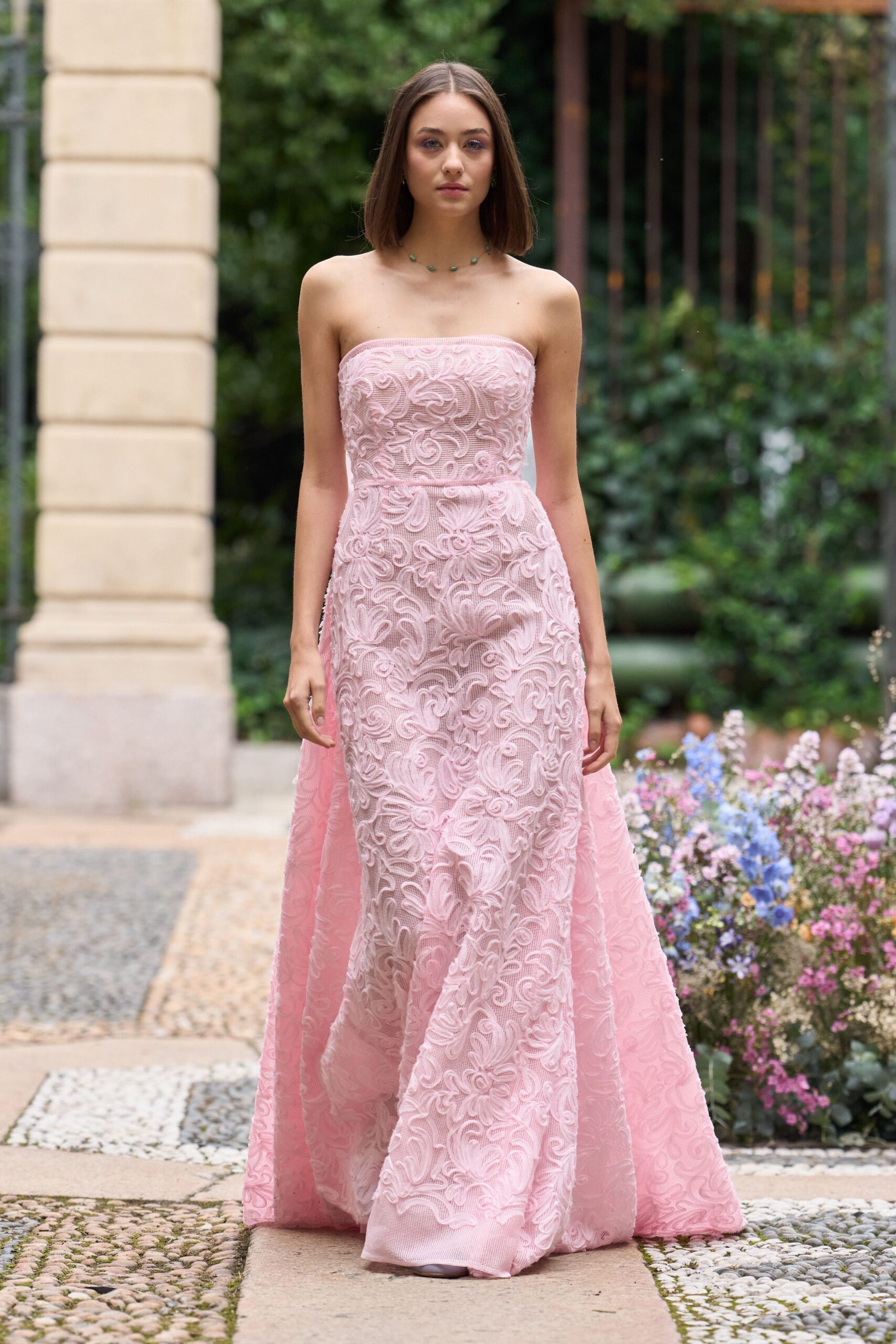 pink embroidered strapless gown