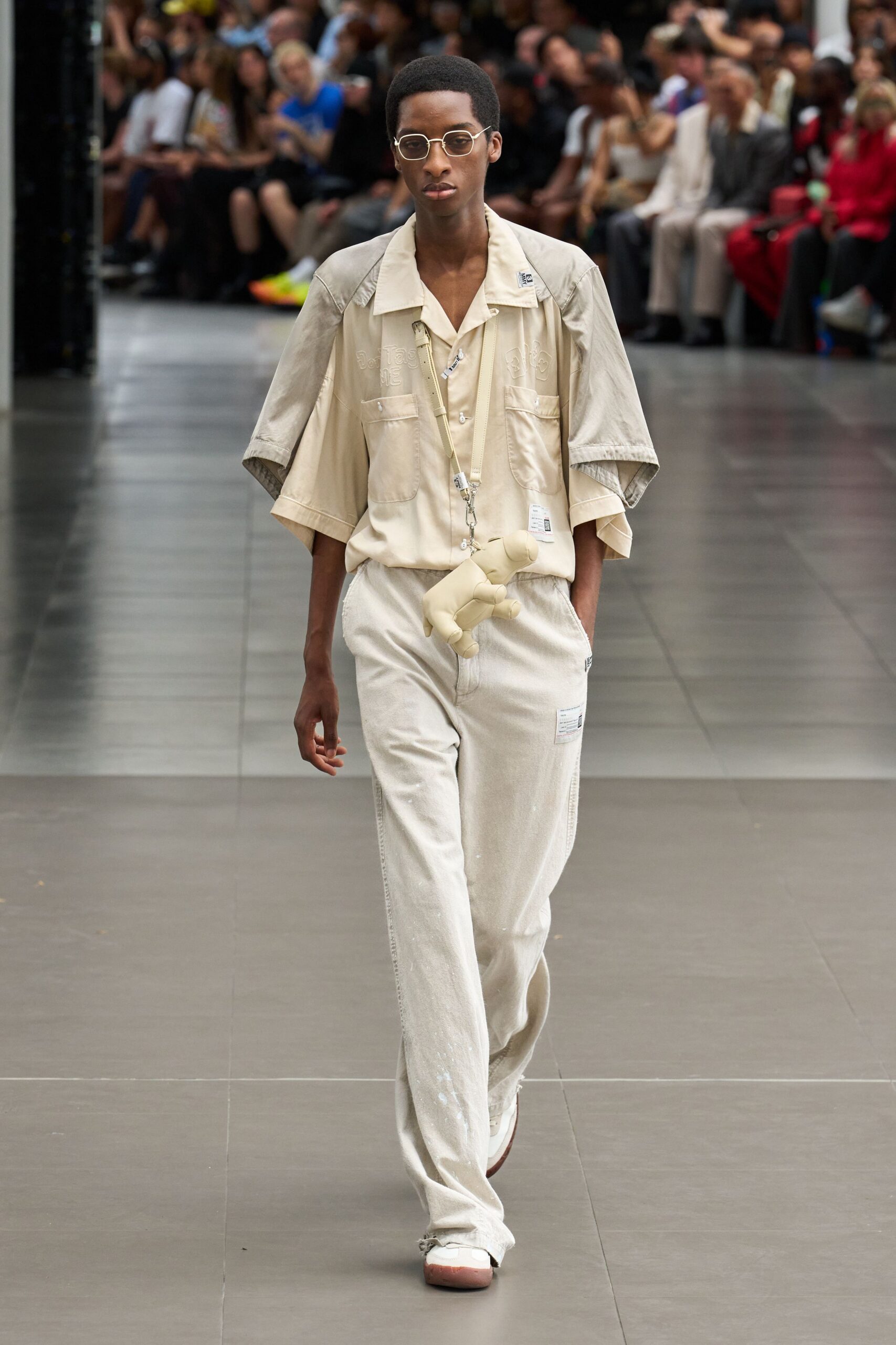 beige relaxed shirt with white pants