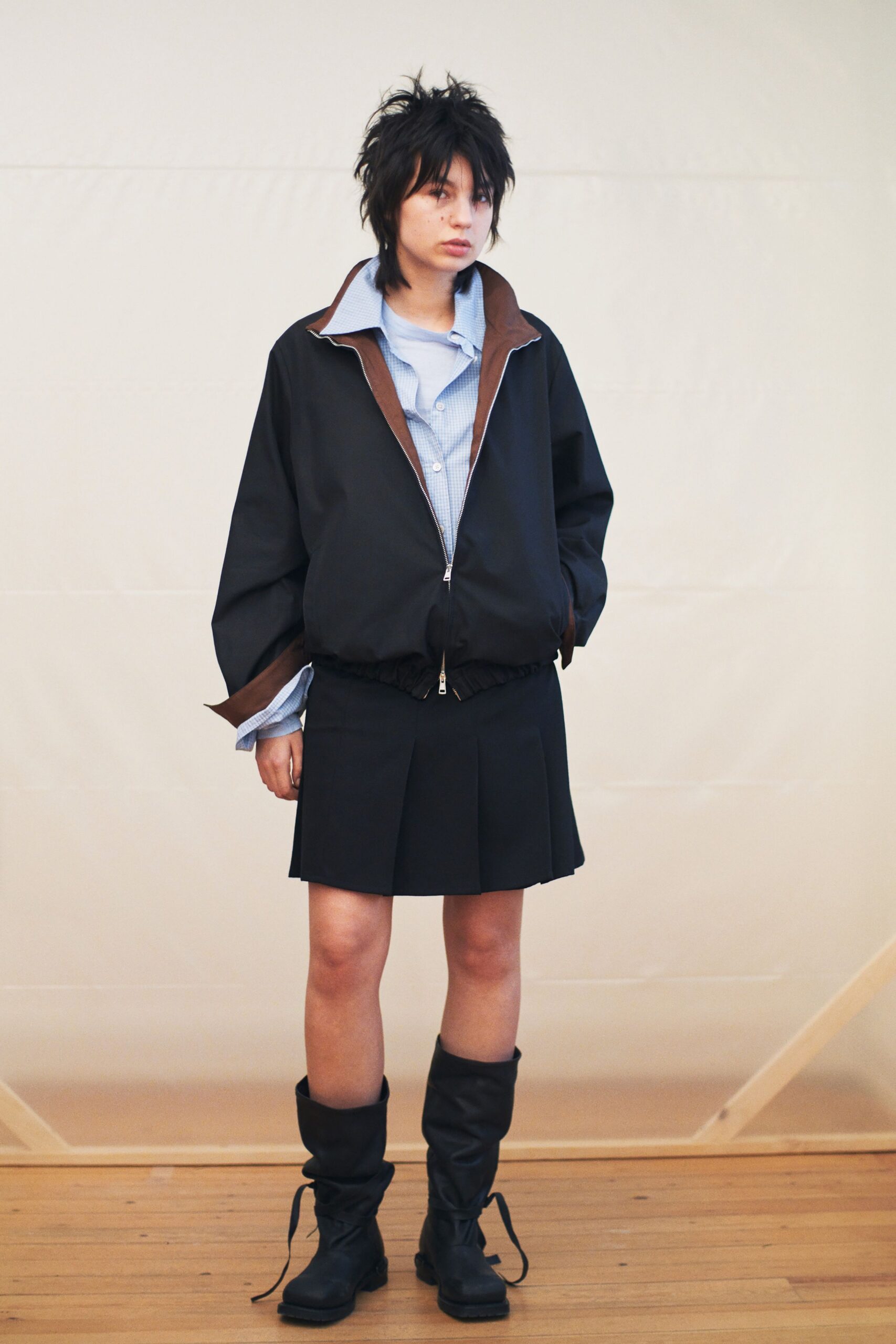 black jacket with blue shirt