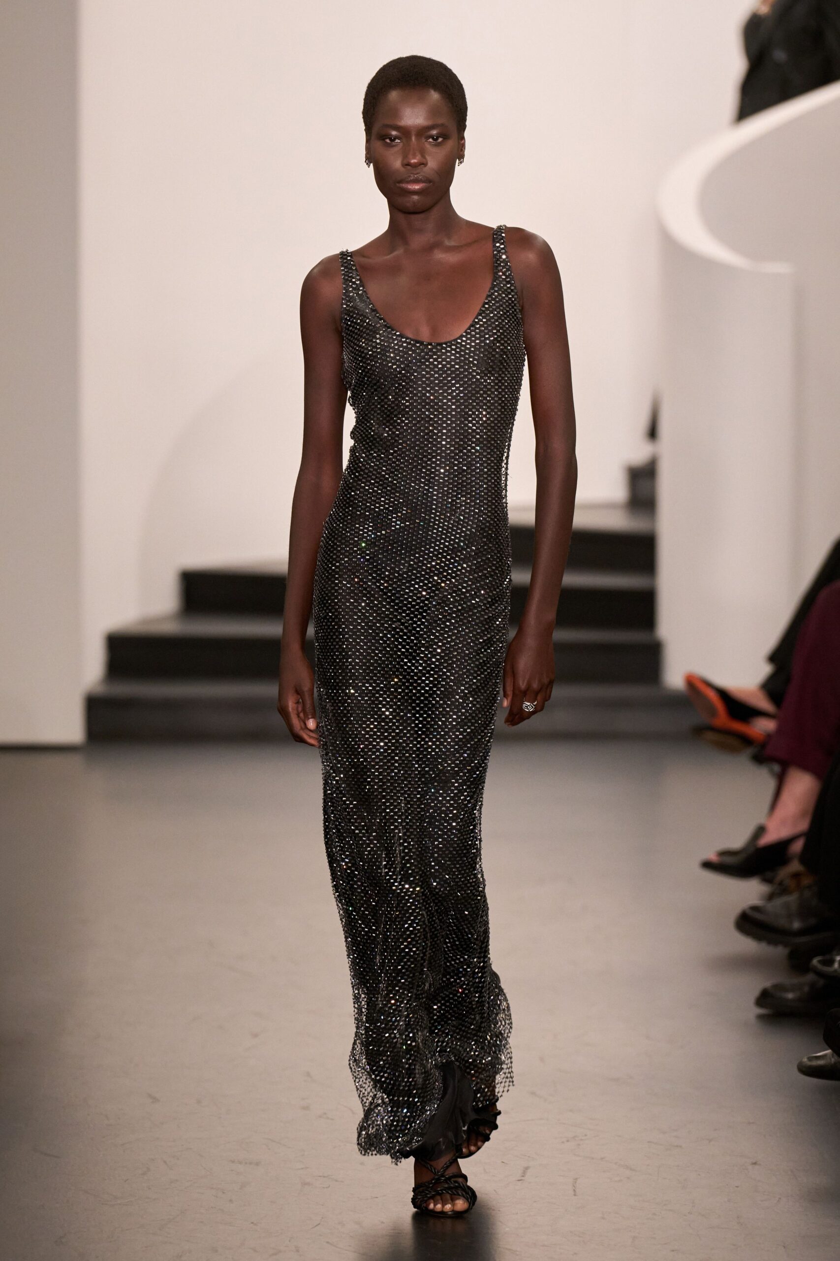 black sequined sleeveless gown