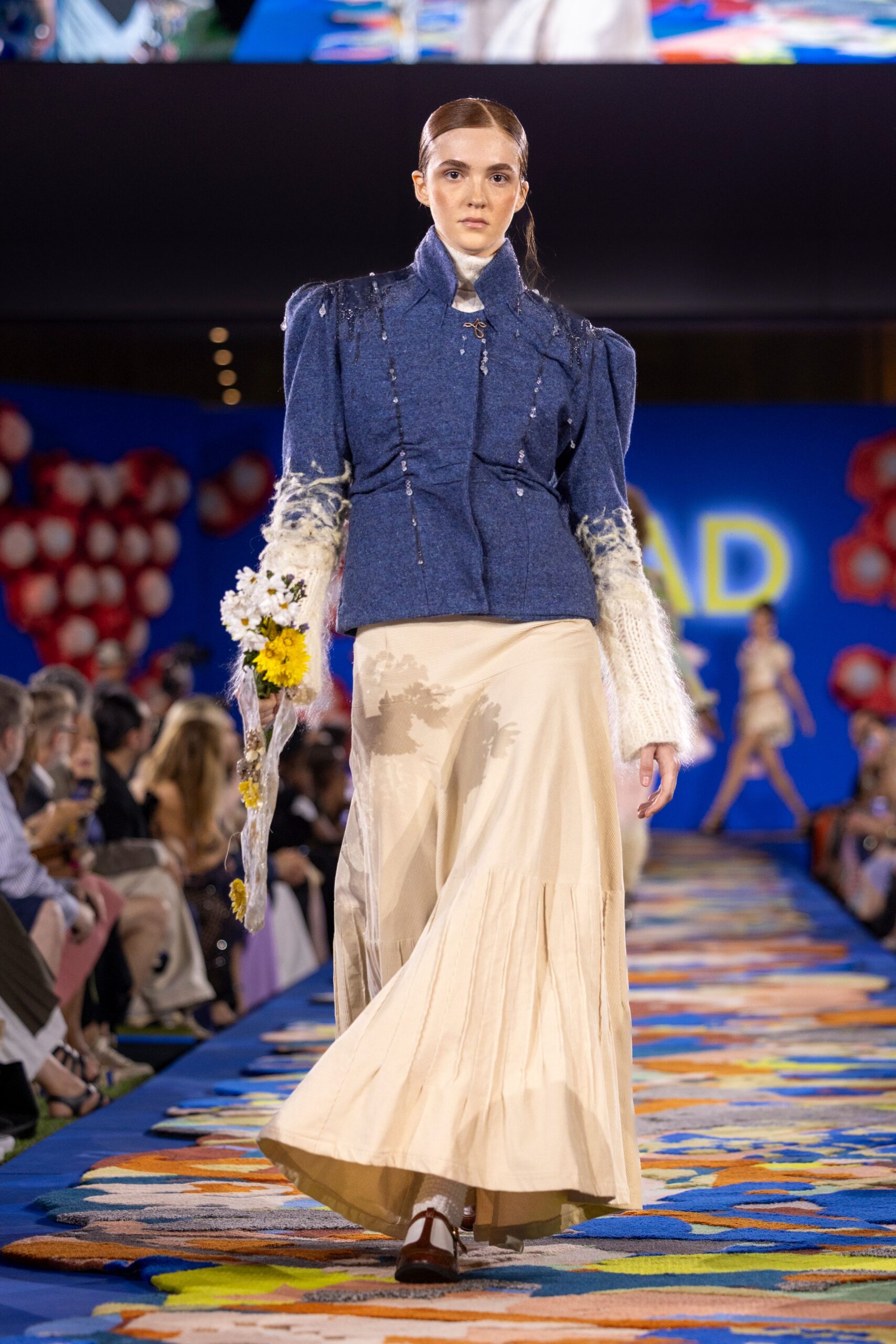 blue denim structured jacket with beige maxi skirt