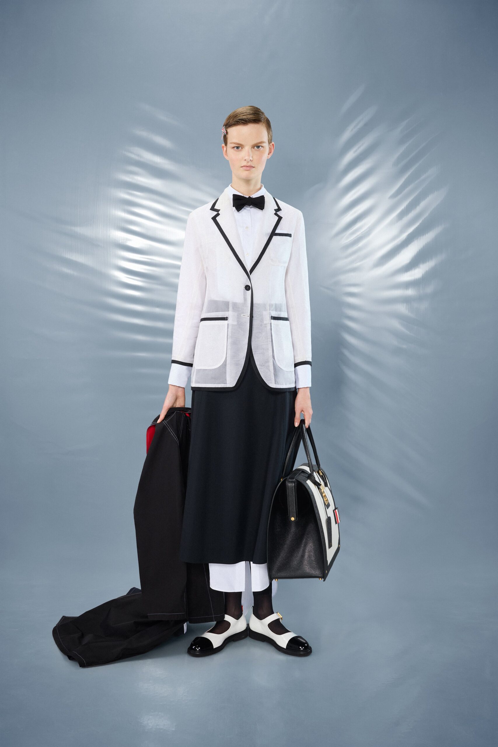 white cotton long-sleeve collared structured buttoned pockets blazer
