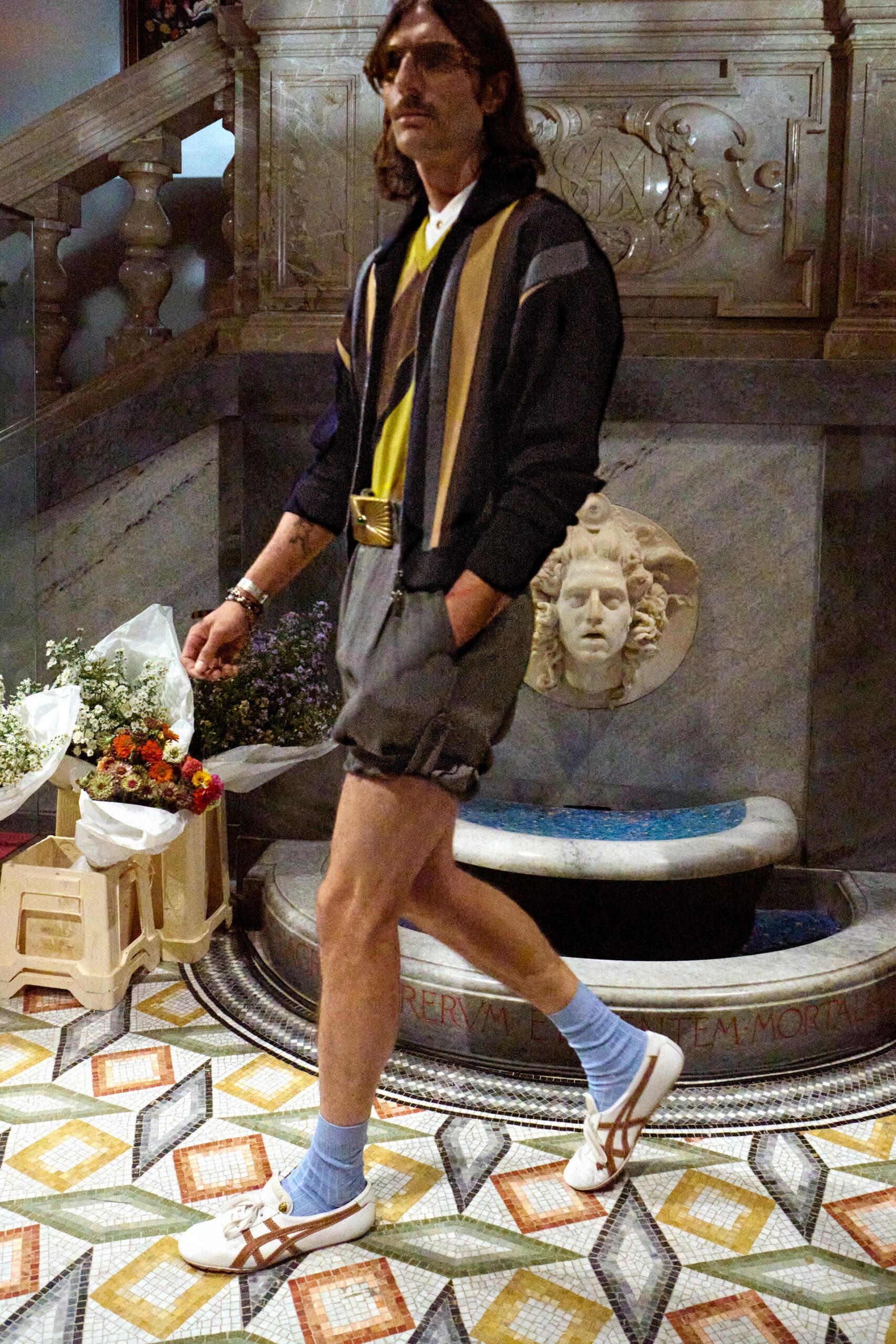 black and yellow relaxed shirt with gray shorts