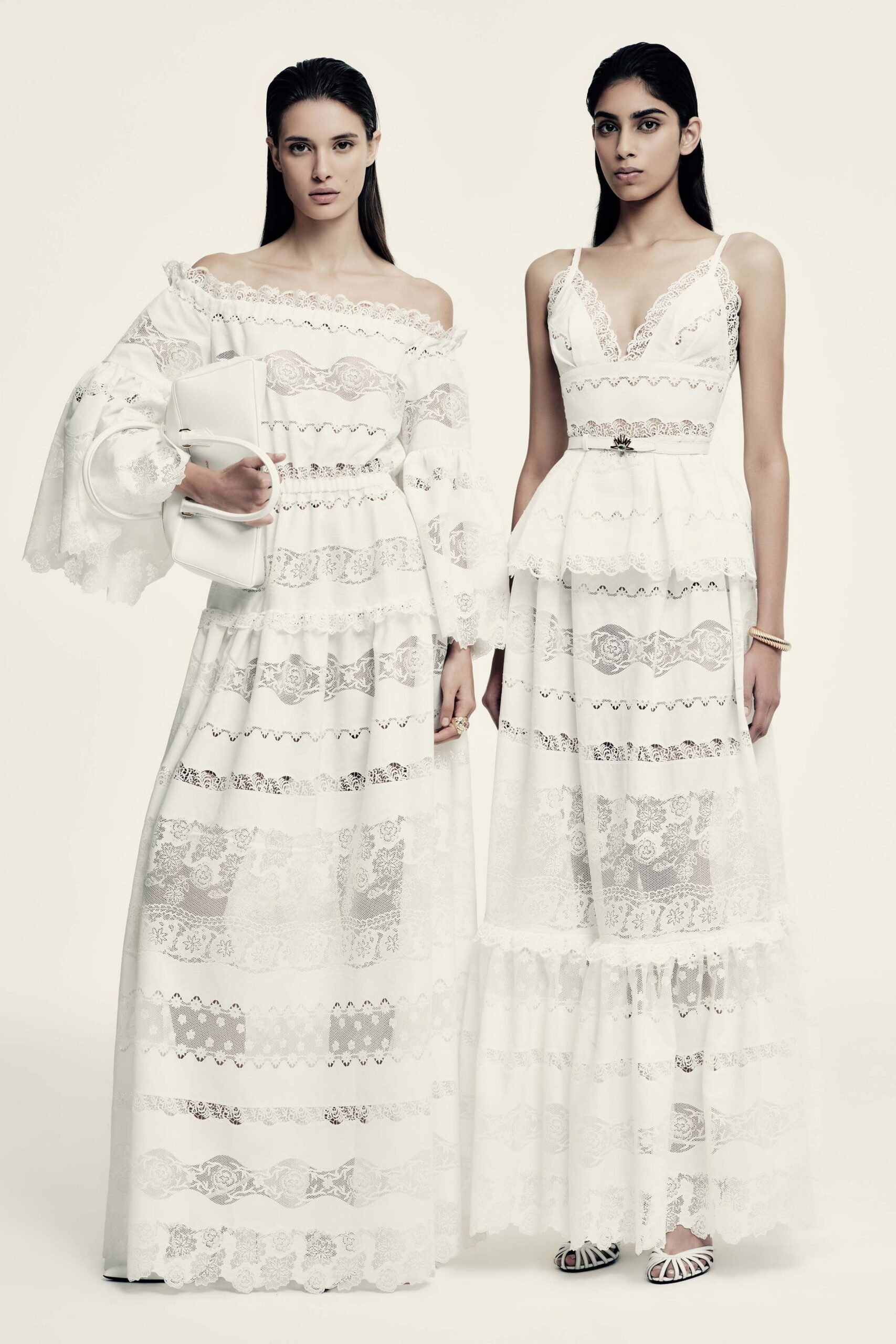 white lace off-shoulder long-sleeve fitted tiered embroidered gown